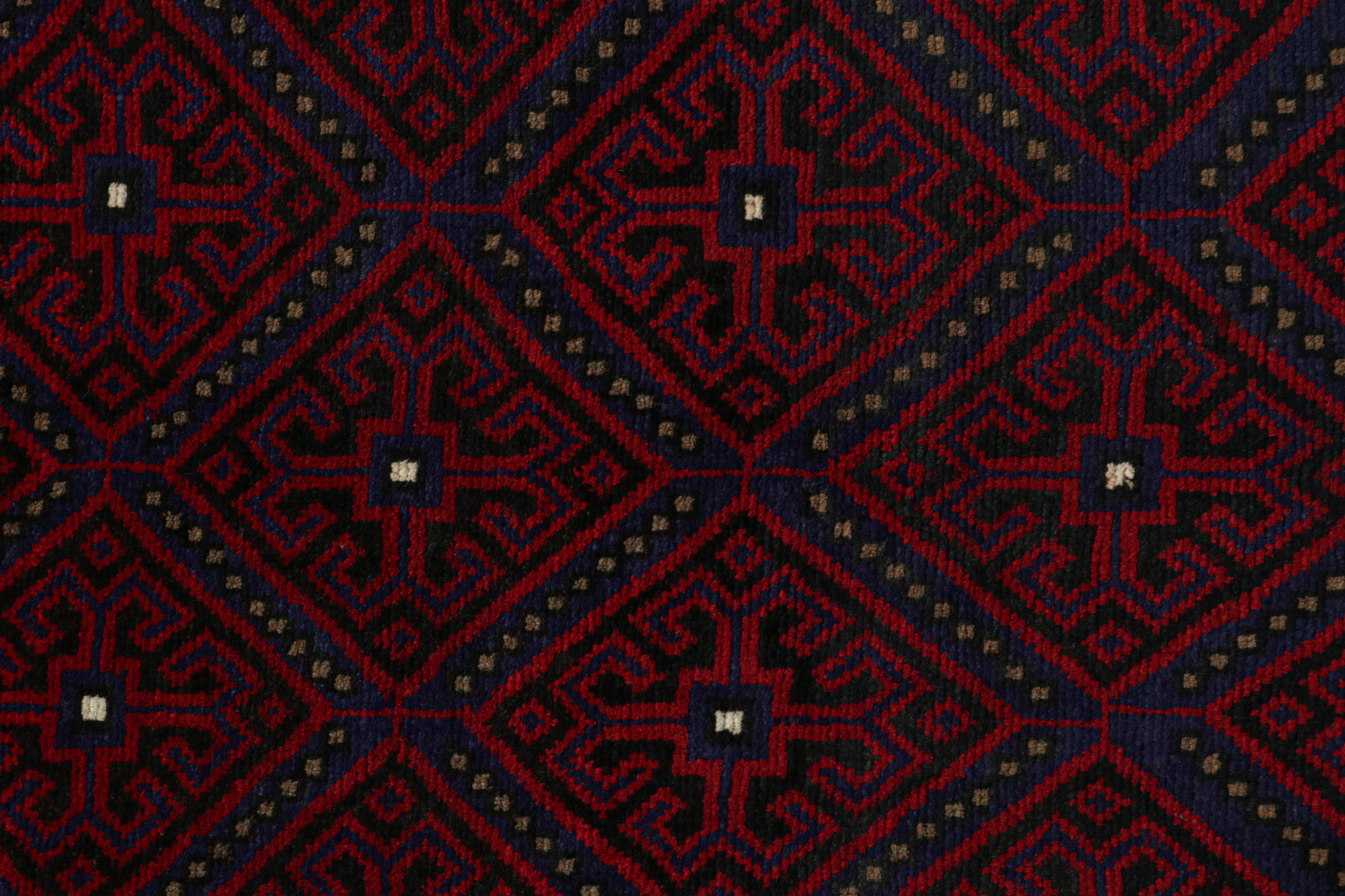 Mid-20th Century Vintage Baluch Persian rug in Red, Blue & Black Patterns from Rug & Kilim For Sale