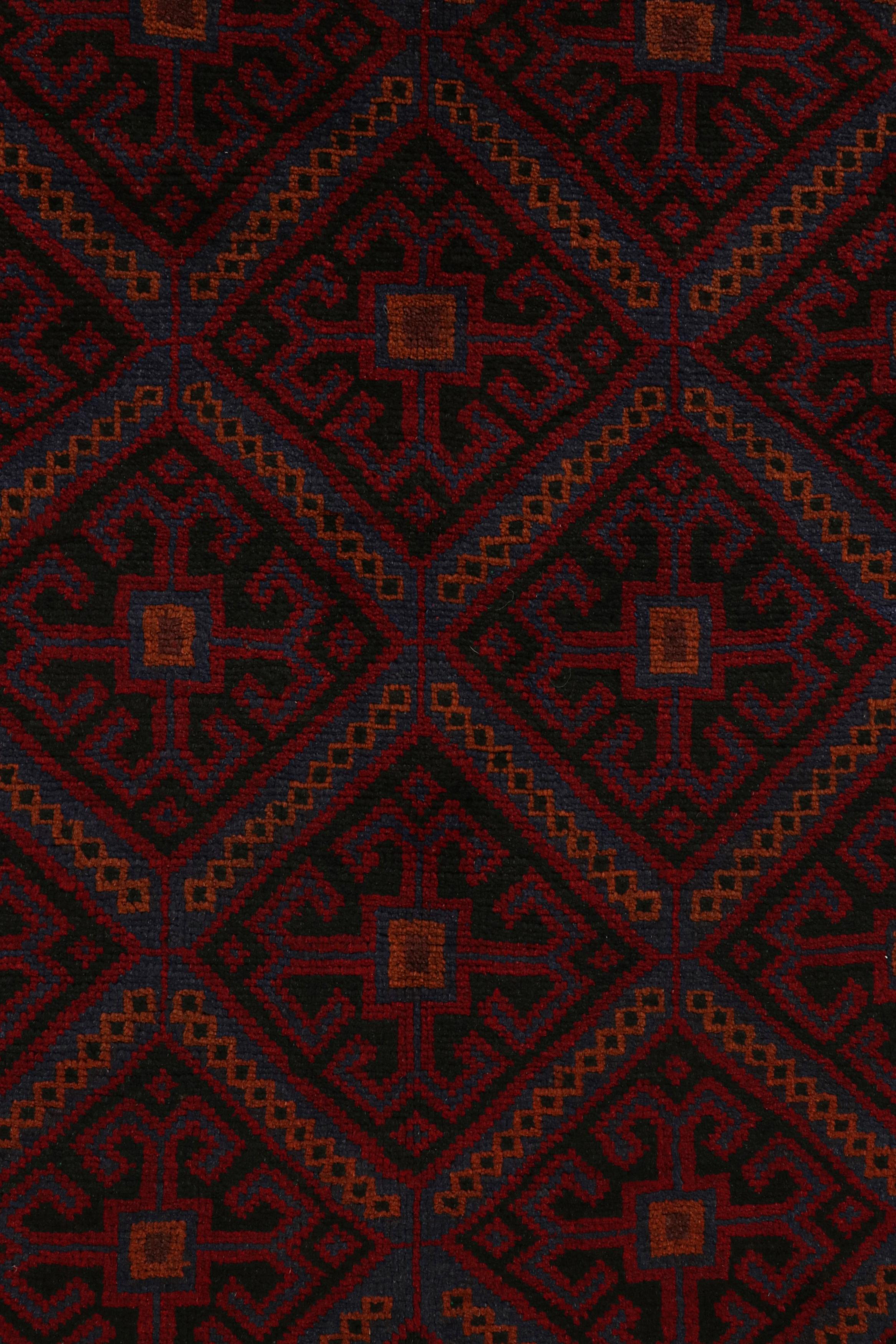 Mid-20th Century Vintage Baluch Persian rug in Red, Blue & Black Patterns from Rug & Kilim For Sale