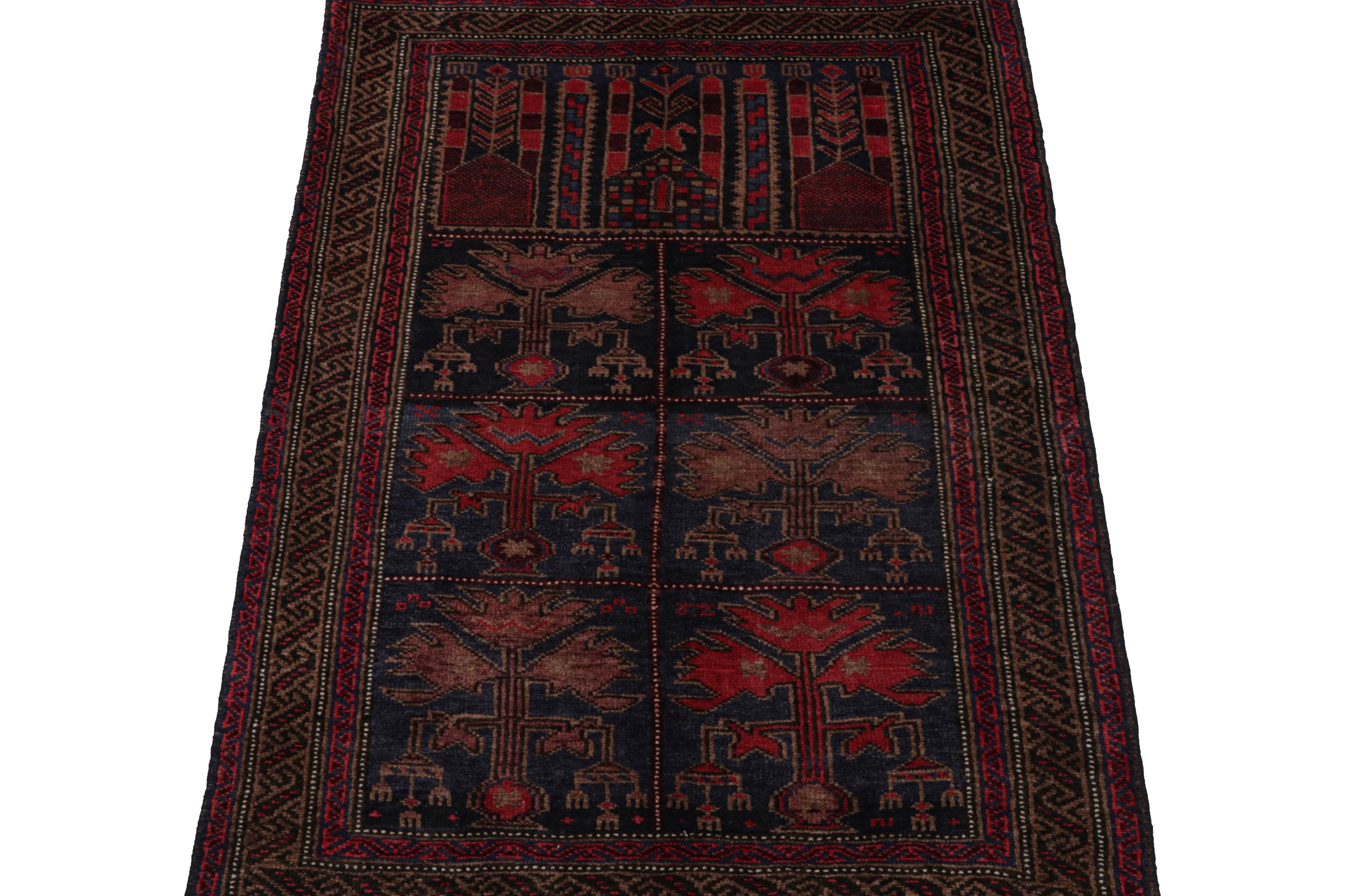 Tribal Vintage Baluch Persian rug in Red & Blue Pictorial Patterns from Rug & Kilim For Sale