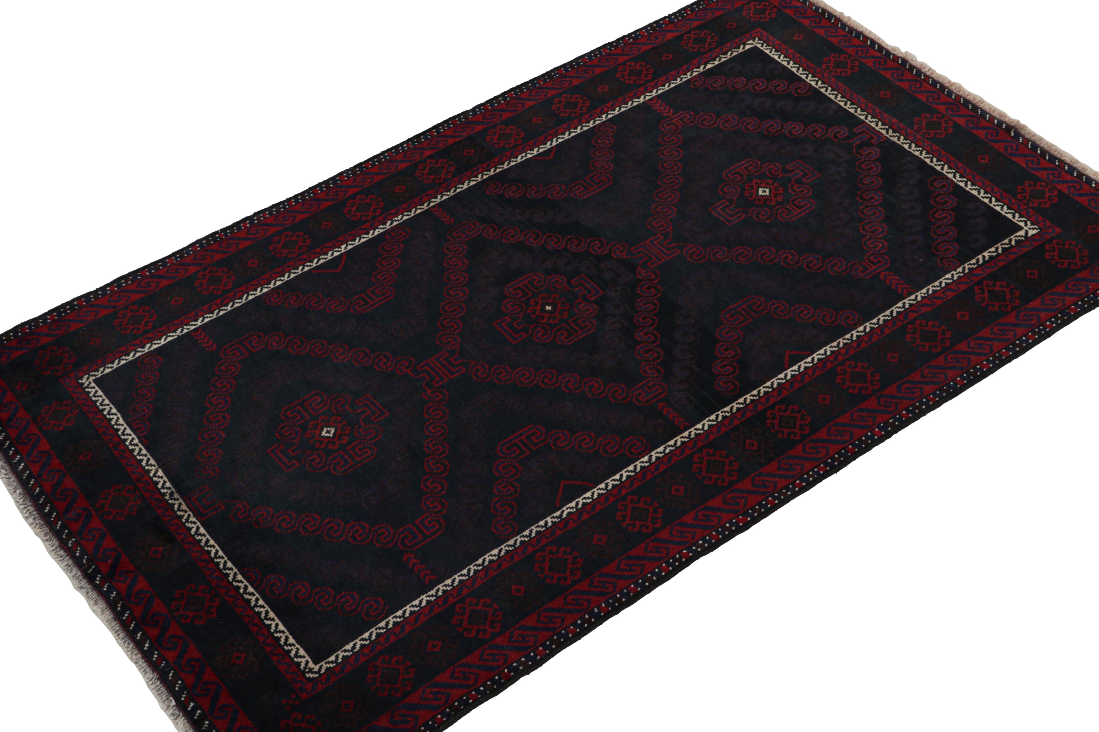 Hand-knotted in wool, this 4x7 Baluch Persian rug of the 1950s is the latest to enter Rug & Kilim’s Antique & Vintage collection.

On the Design:

The piece features tribal geometric patterns in tones of red & blue with fine white detailing. A keen