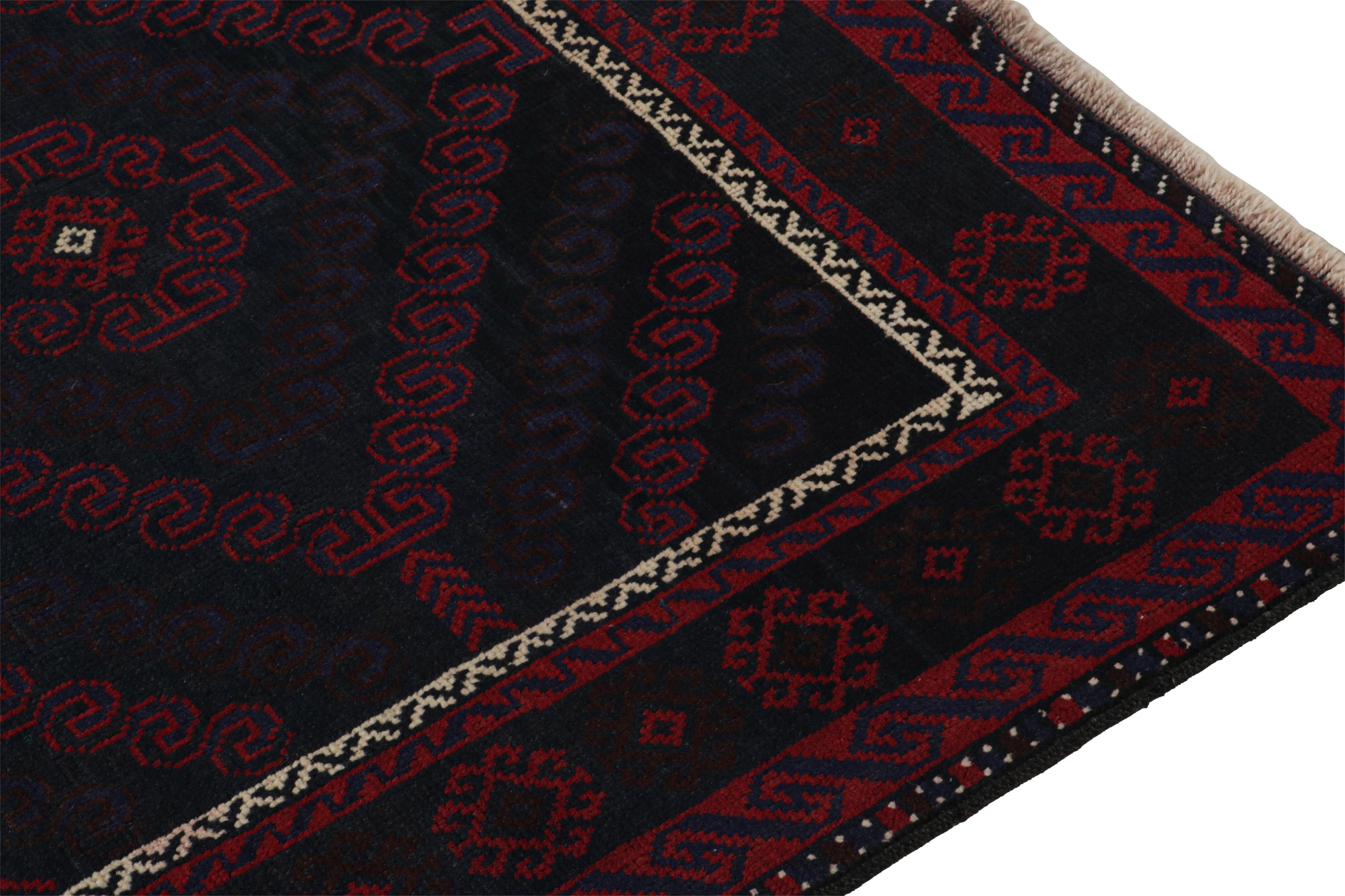Mid-20th Century Vintage Baluch Persian rug in Red & Blue Tribal Patterns from Rug & Kilim For Sale