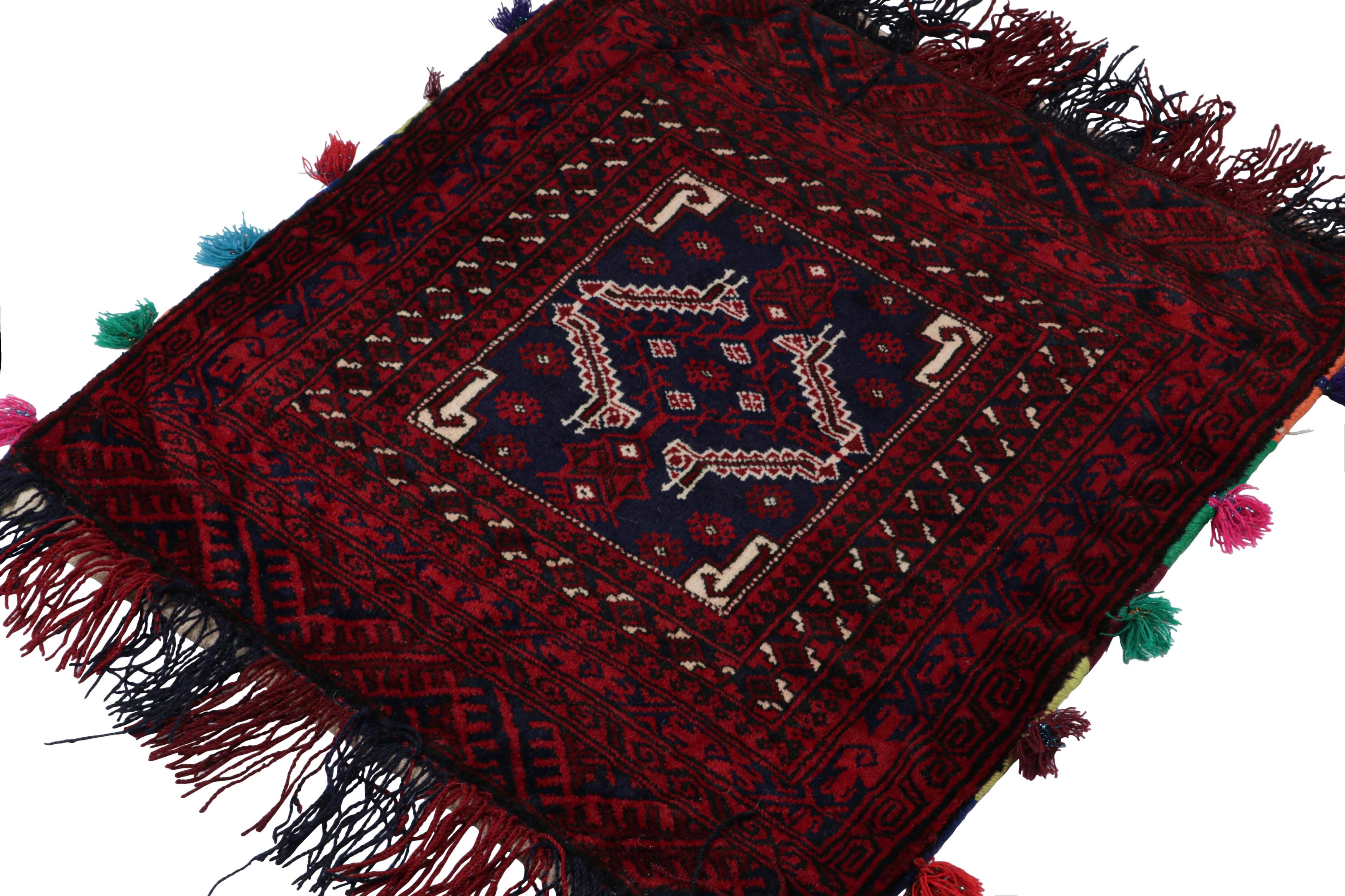 Hand-knotted in wool, this 2x2 Baluch Persian rug of the 1950s is the latest to enter Rug & Kilim’s Antique & Vintage collection.

On the Design:

The vintage Baluch rug carries a striking medallion with tribal patterns in rich tones of red, blue &