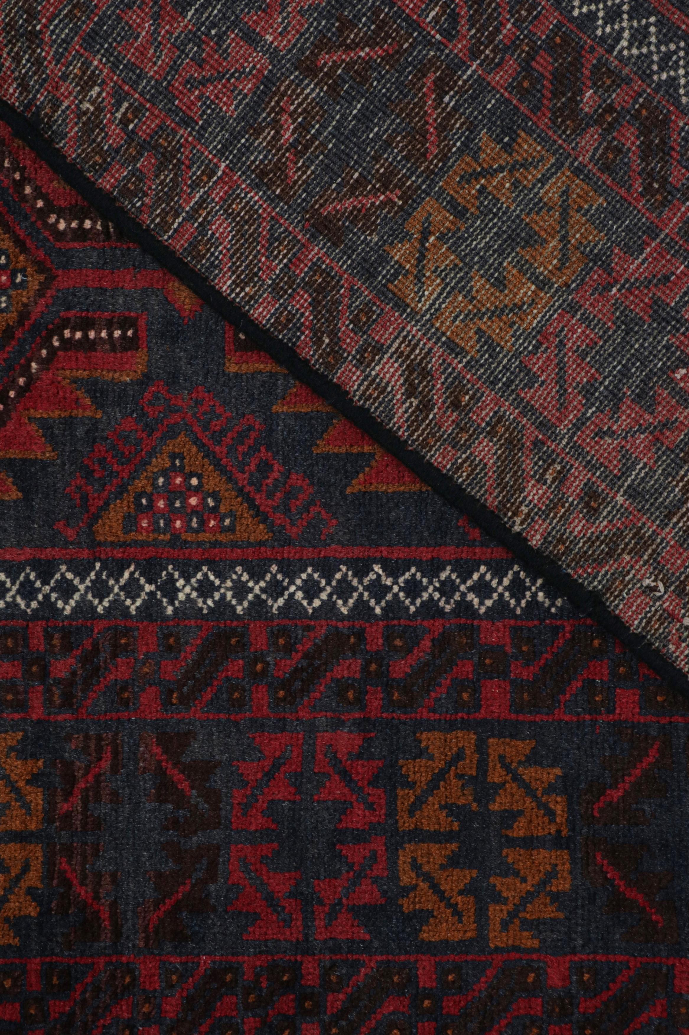 Wool Vintage Baluch Persian rug in Red & Brown on Blue Patterns from Rug & Kilim For Sale