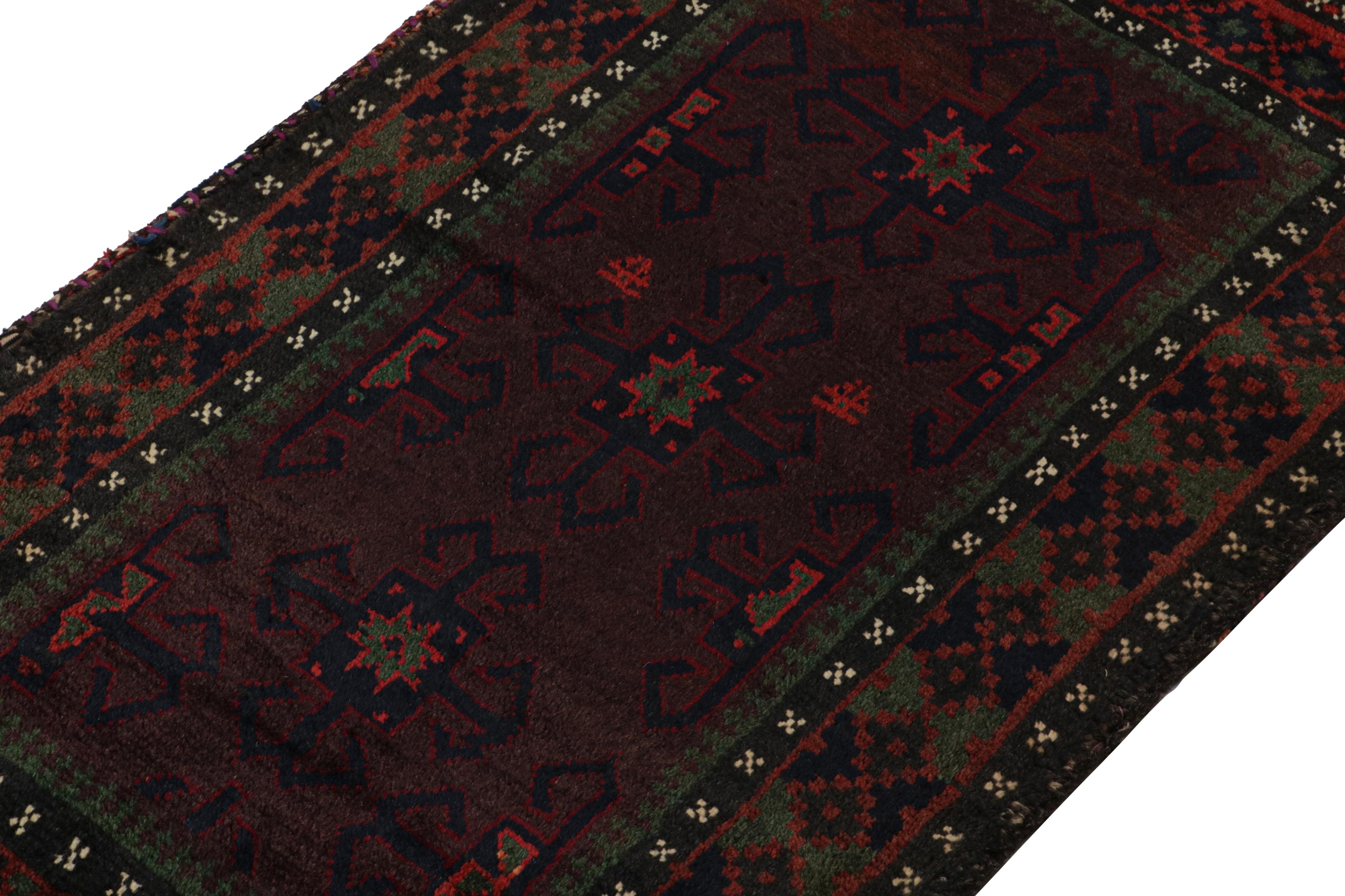 Hand-Knotted Vintage Baluch Persian rug in Red, Green, Blue & Black Patterns from Rug & Kilim For Sale