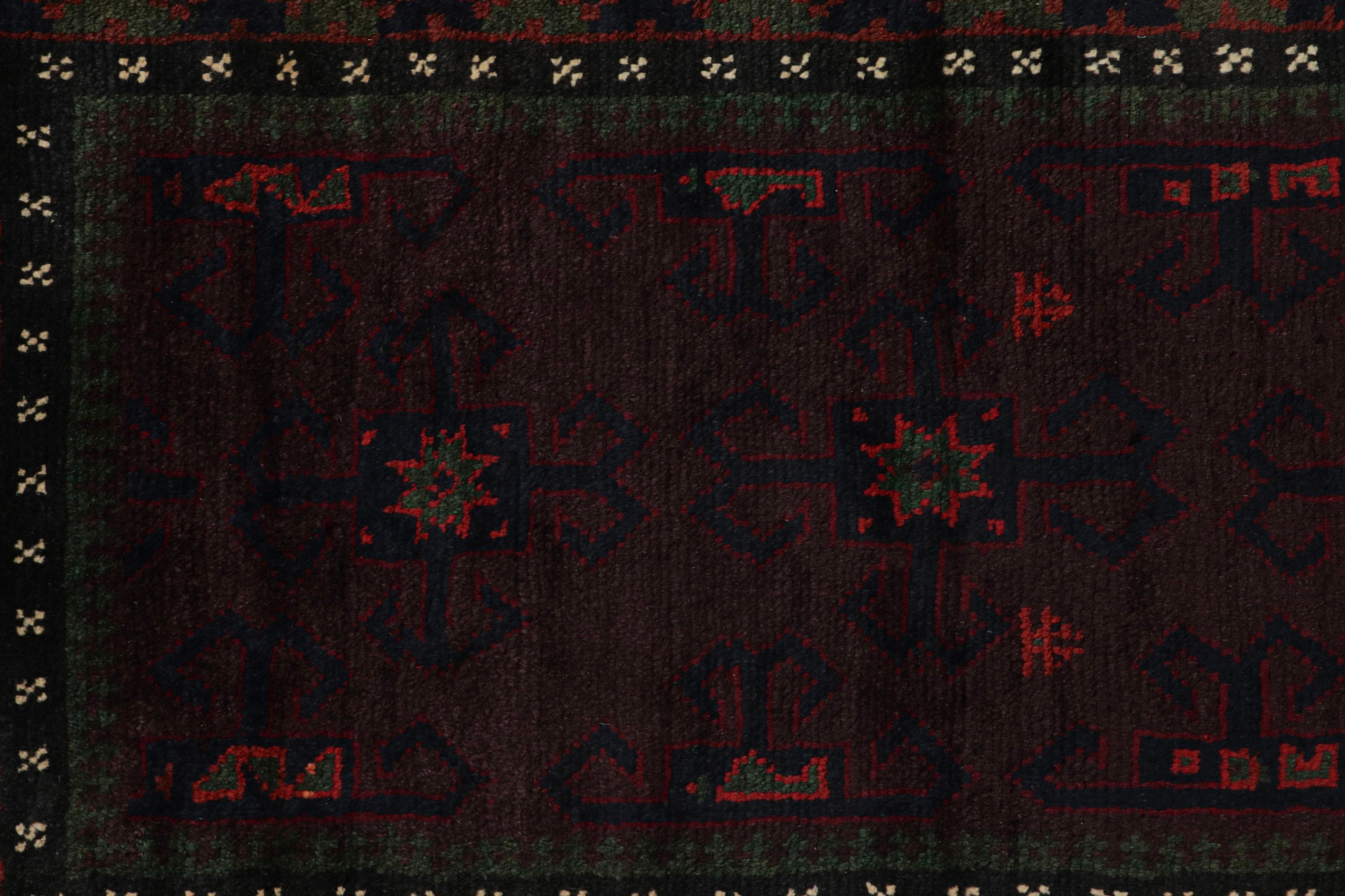Mid-20th Century Vintage Baluch Persian rug in Red, Green, Blue & Black Patterns from Rug & Kilim For Sale