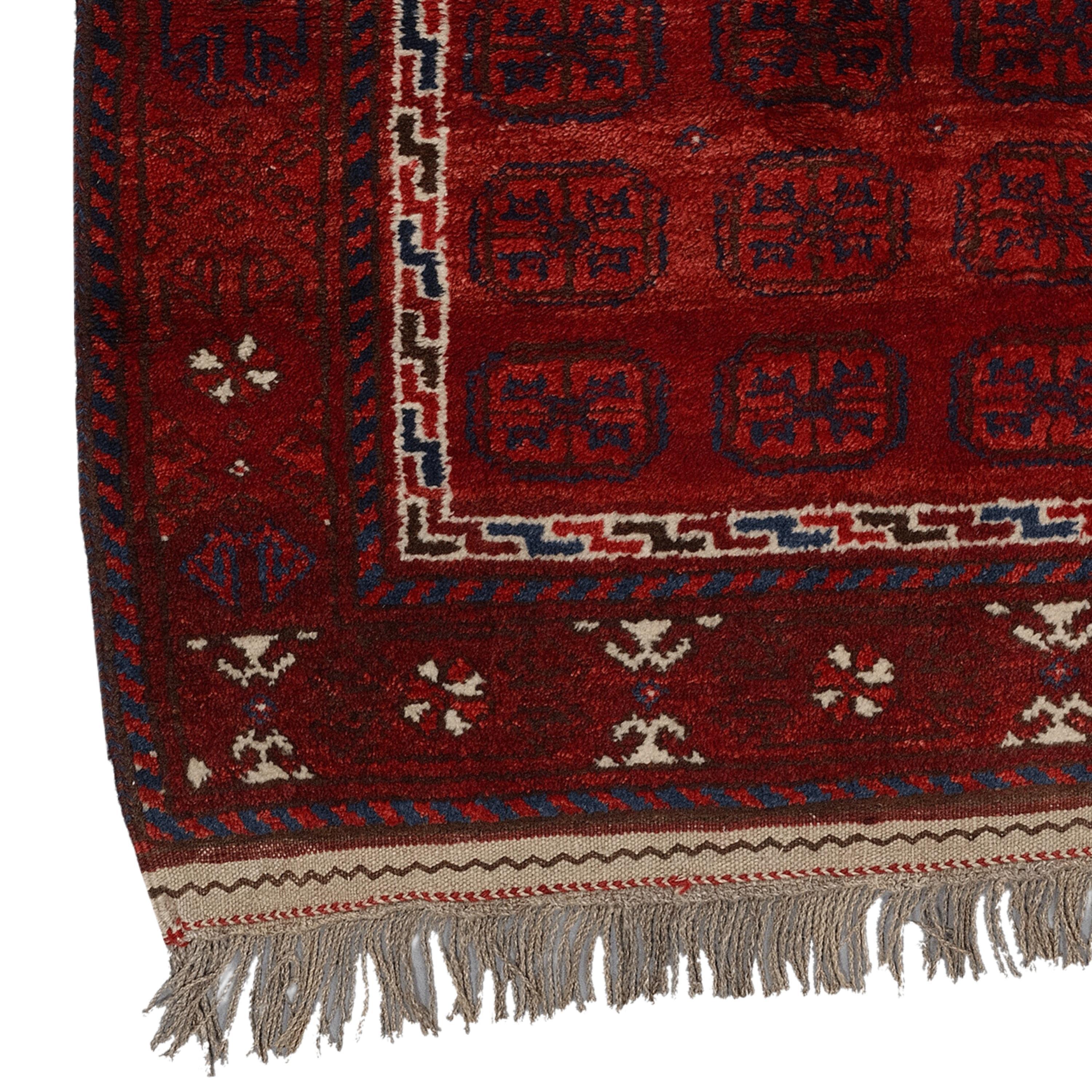 Vintage Baluch Prayer Rug
20th Century Baluch Rug
90x112cm  2,95x3,67 Ft

The colors used in these antique rugs were dark tones of red, brown, blue, purple and ivory. All the Baluch rugs have a heavy use of black outlines and black shades making the