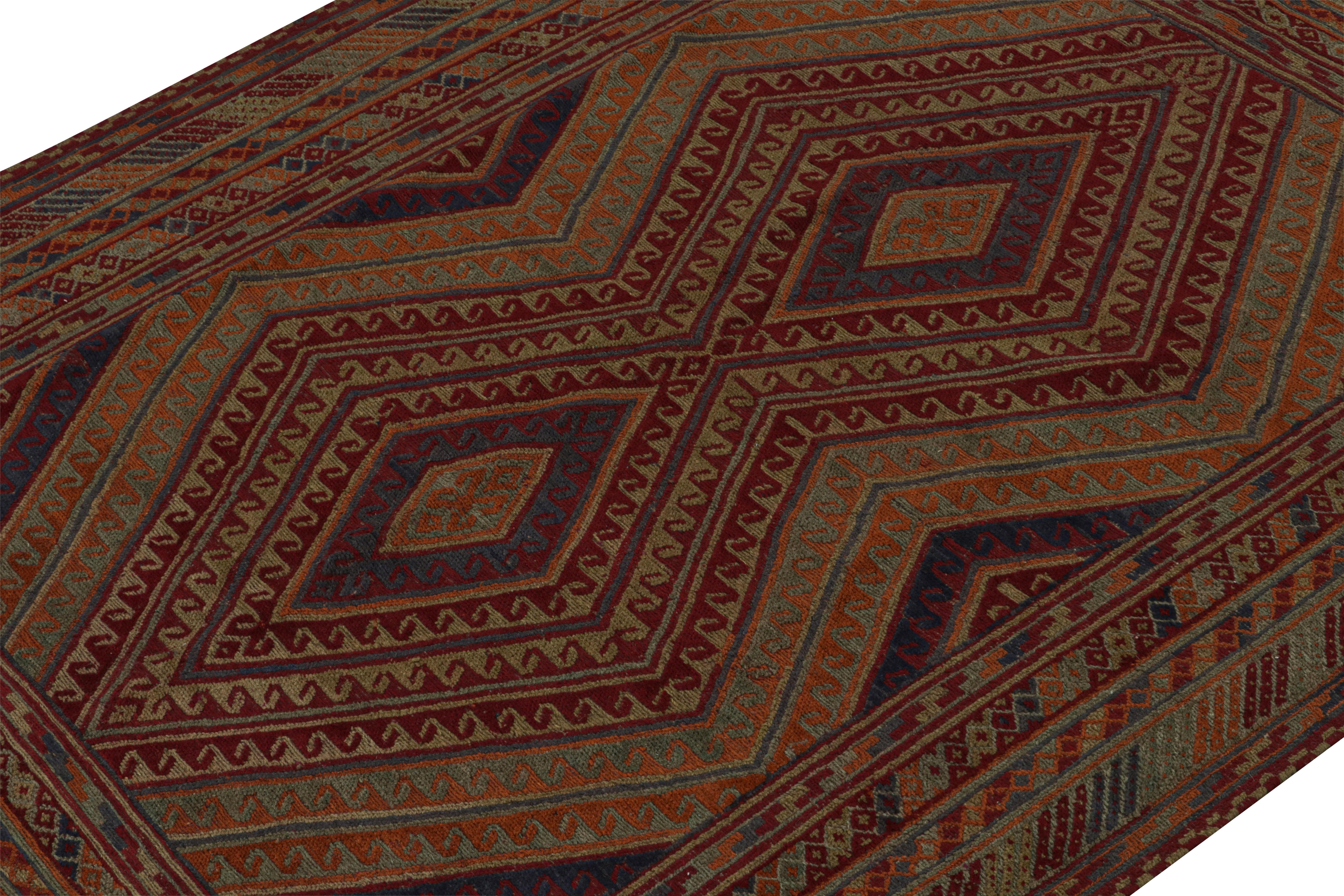 Afghan Tapis Baluch vintage à motifs dorés, bleus, rouges et verts, de Rug & Kilim  en vente