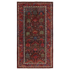 Tapis Vintage Baluch, avec des motifs géométriques polychromes, de Rug & Kilim