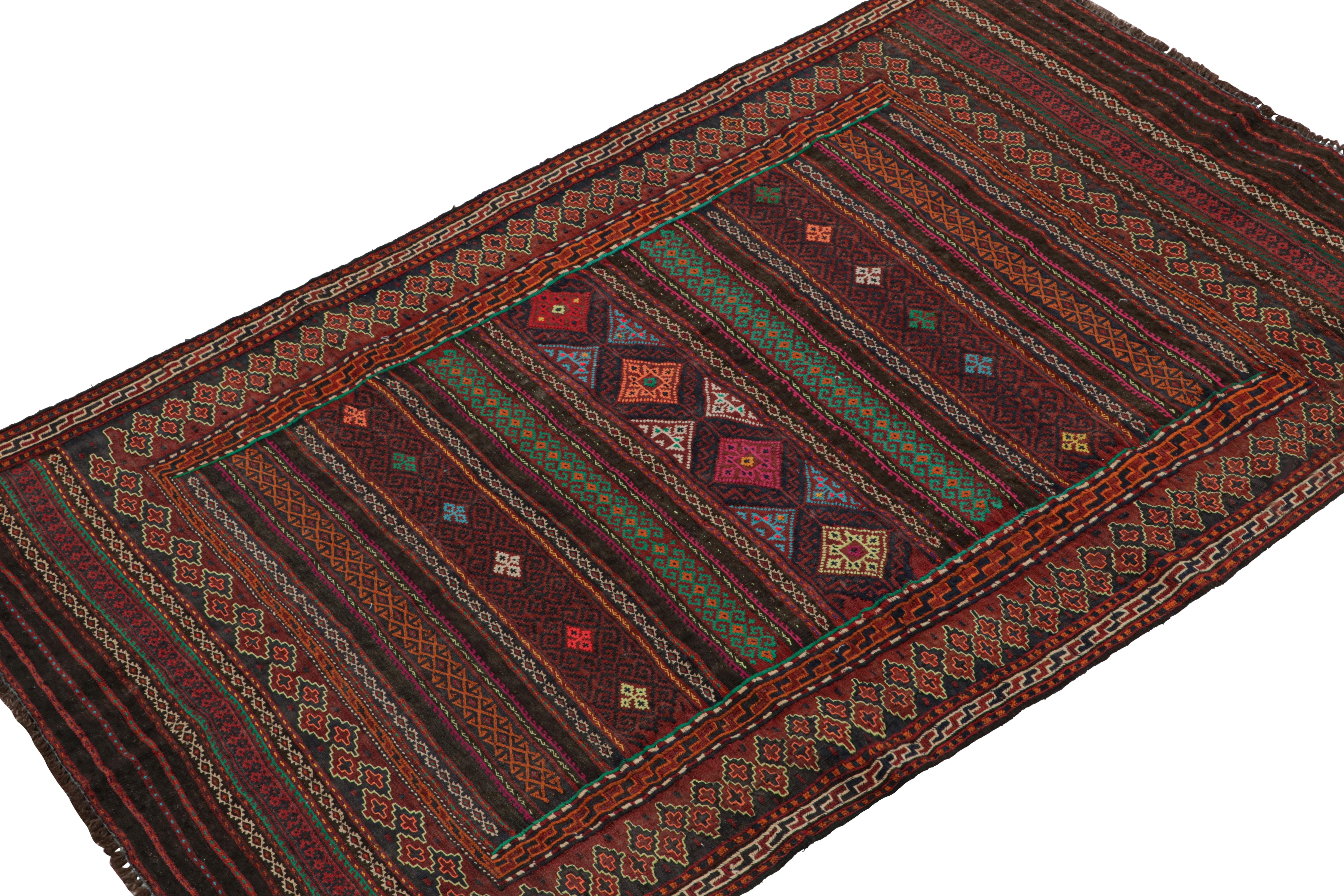 Handwoven in wool circa 1950-1960,  this 4x6 vintage Baluch Kilim  is a new curation from Rug & Kilim’s primitivist flatweaves. 

On the Design:

Specifically believed to hail from the Leghari clan of this nomadic people, this tribal rug enjoys rich