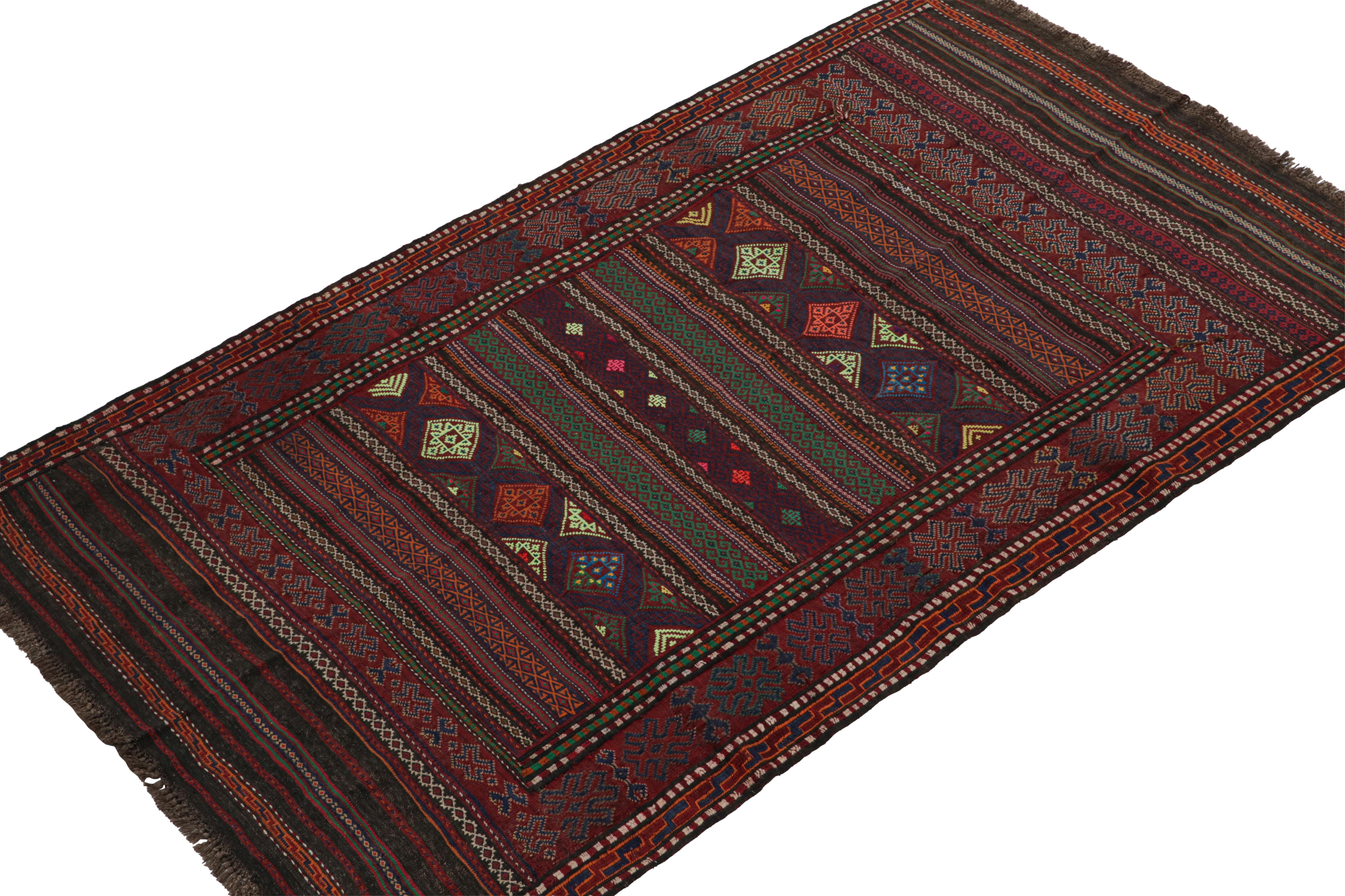 Handwoven in wool circa 1950-1960, this 4x7 vintage Baluch Kilim is a new curation from Rug & Kilim’s primitivist flatweaves. 

On the Design:

Specifically believed to originate from the Leghari clan of the Baluch tribe, this tribal rug boasts a