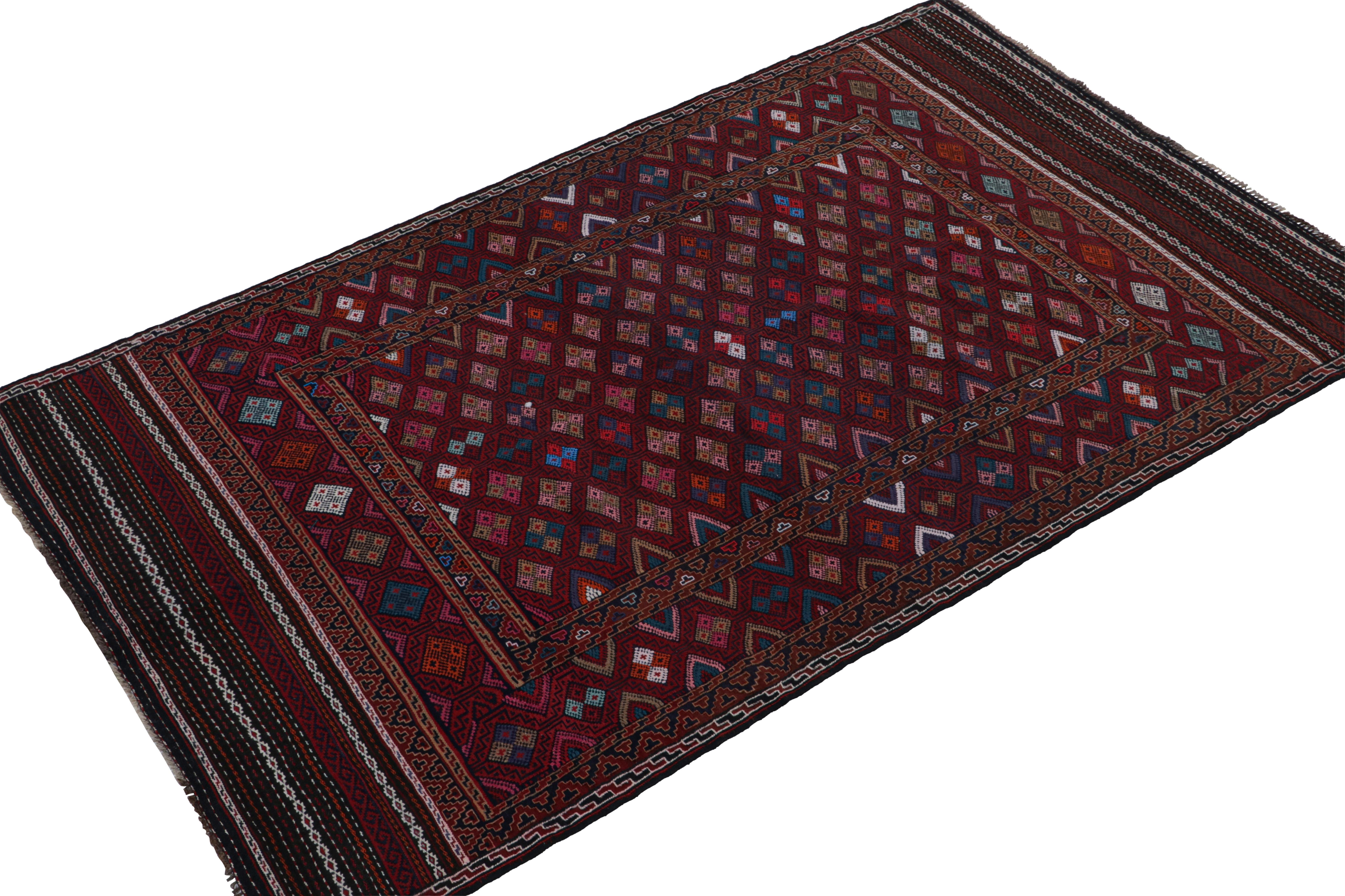 Handwoven in wool circa 1950-1960, this 5x8 vintage kilim is a Baluch rug from Rug & Kilim’s collection of tribal flatweaves. 

On the Design: 

Specifically believed to hail from the Leghari clan of the same nomadic tribe, this piece enjoys a
