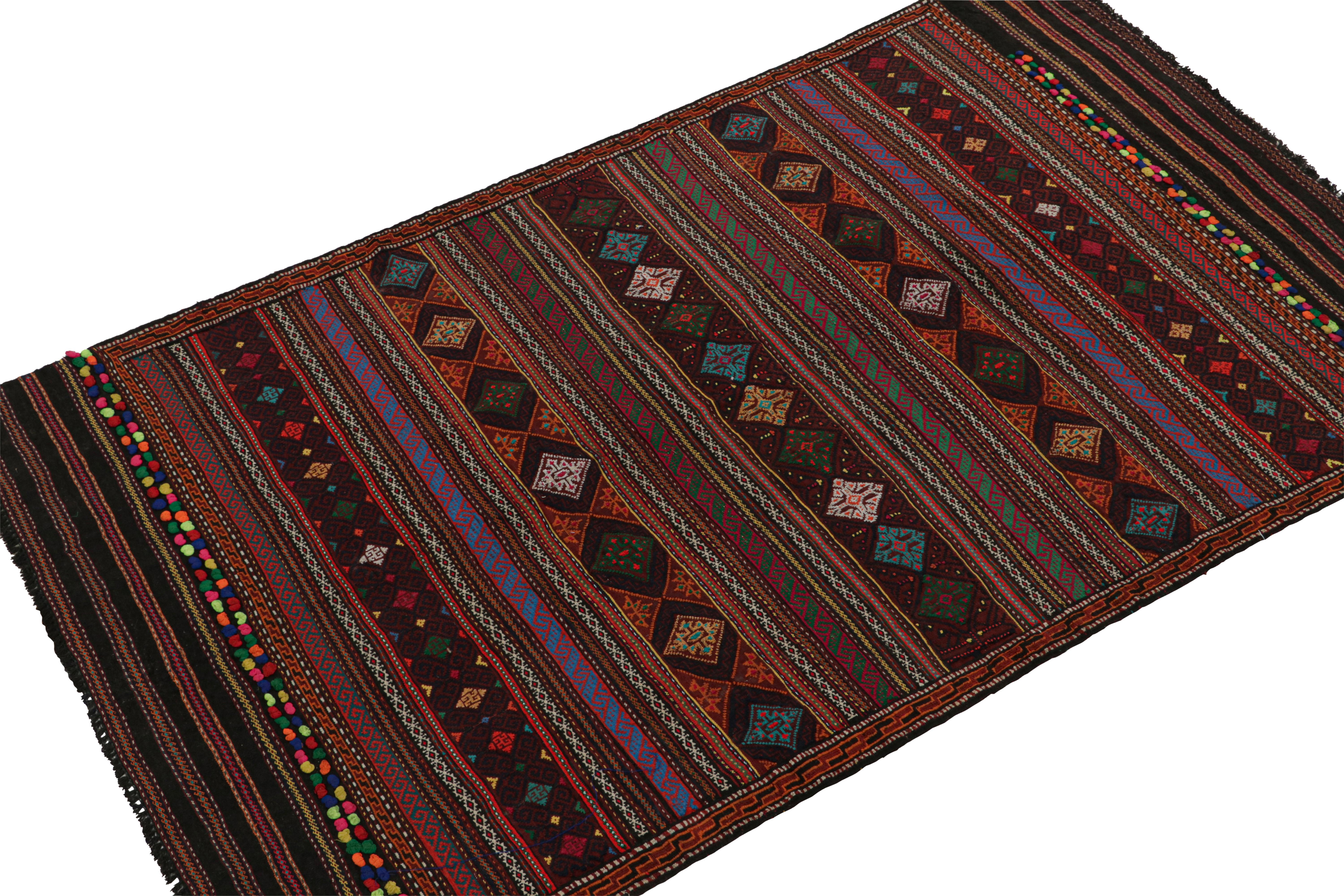 Handwoven in wool circa 1950-1960, this vintage kilim is a Baluch rug from Rug & Kilim’s collection of tribal flatweaves. 

On the Design: 

Specifically believed to hail the Leghari clan of this nomadic tribe, this piece boasts an impressive