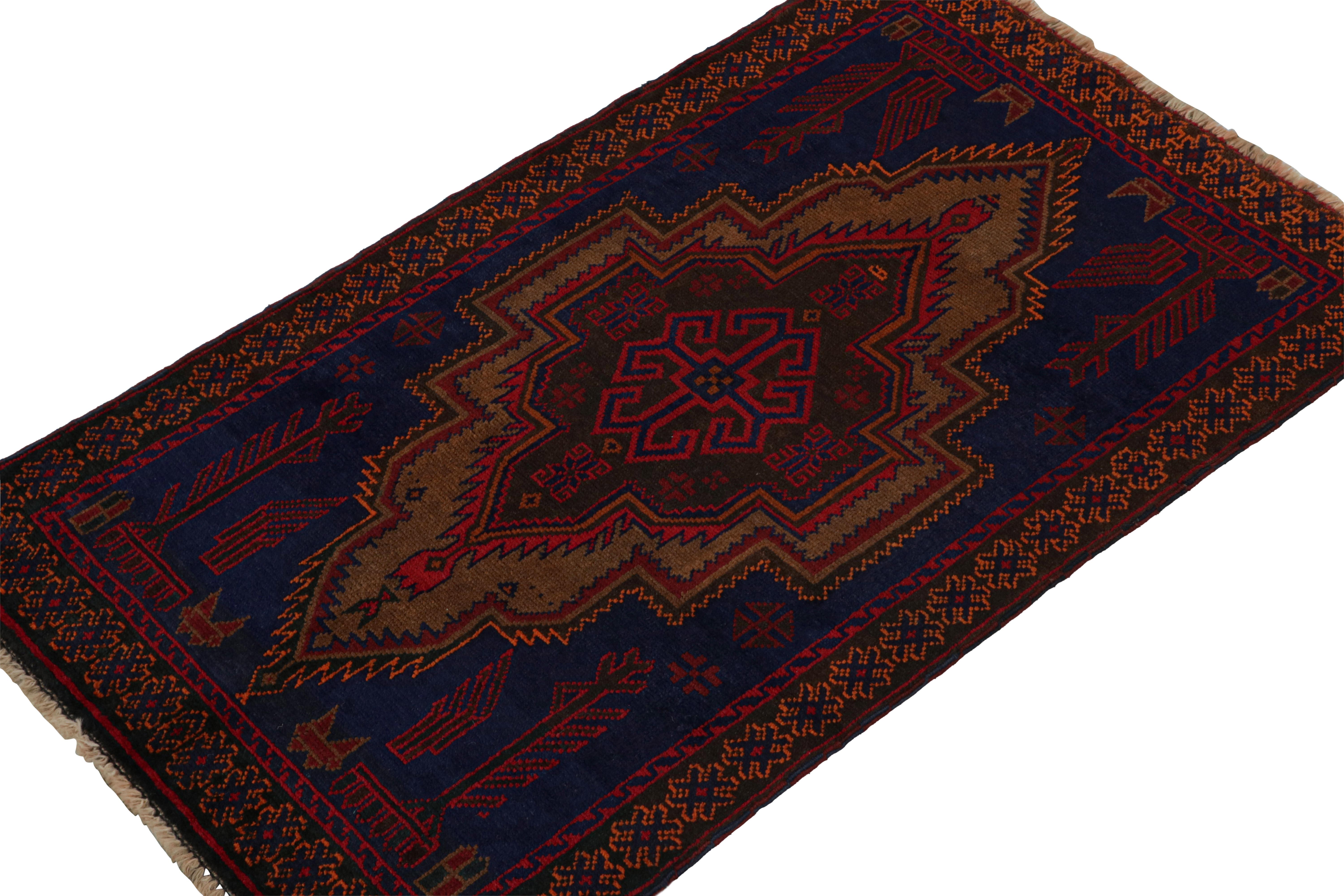 Hand-knotted in wool and goat hair circa 1950-1960, this 3x5 vintage Baluch tribal rug is a new curation from the Rug & Kilim collection.  

On the Design: 

This piece enjoys rich brown and red in a medallion on a navy blue field, and traditional