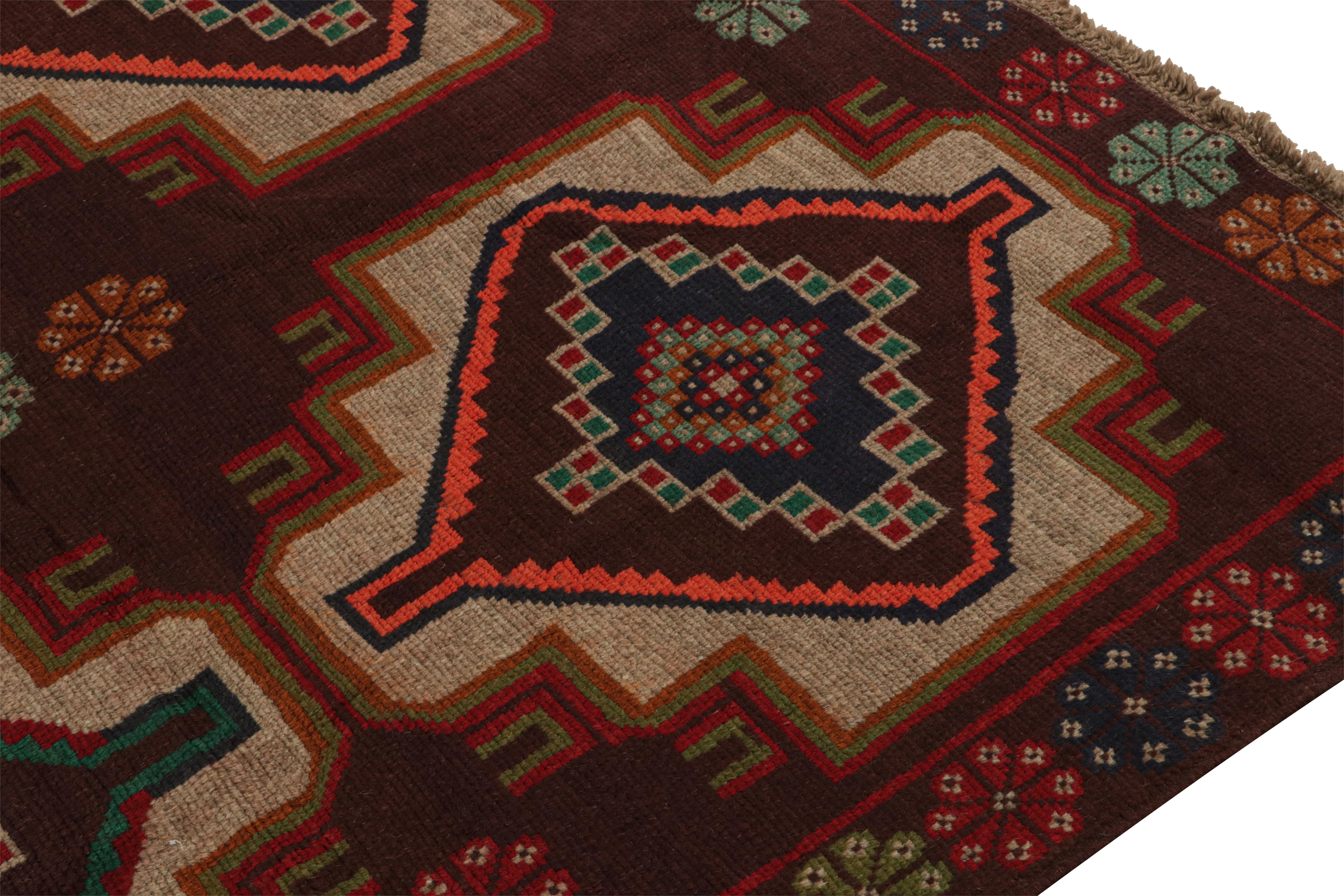 Rug & Kilim’s Afghan Baluch Tribal Rug in Rust Tones with Geometric Medallions In New Condition For Sale In Long Island City, NY