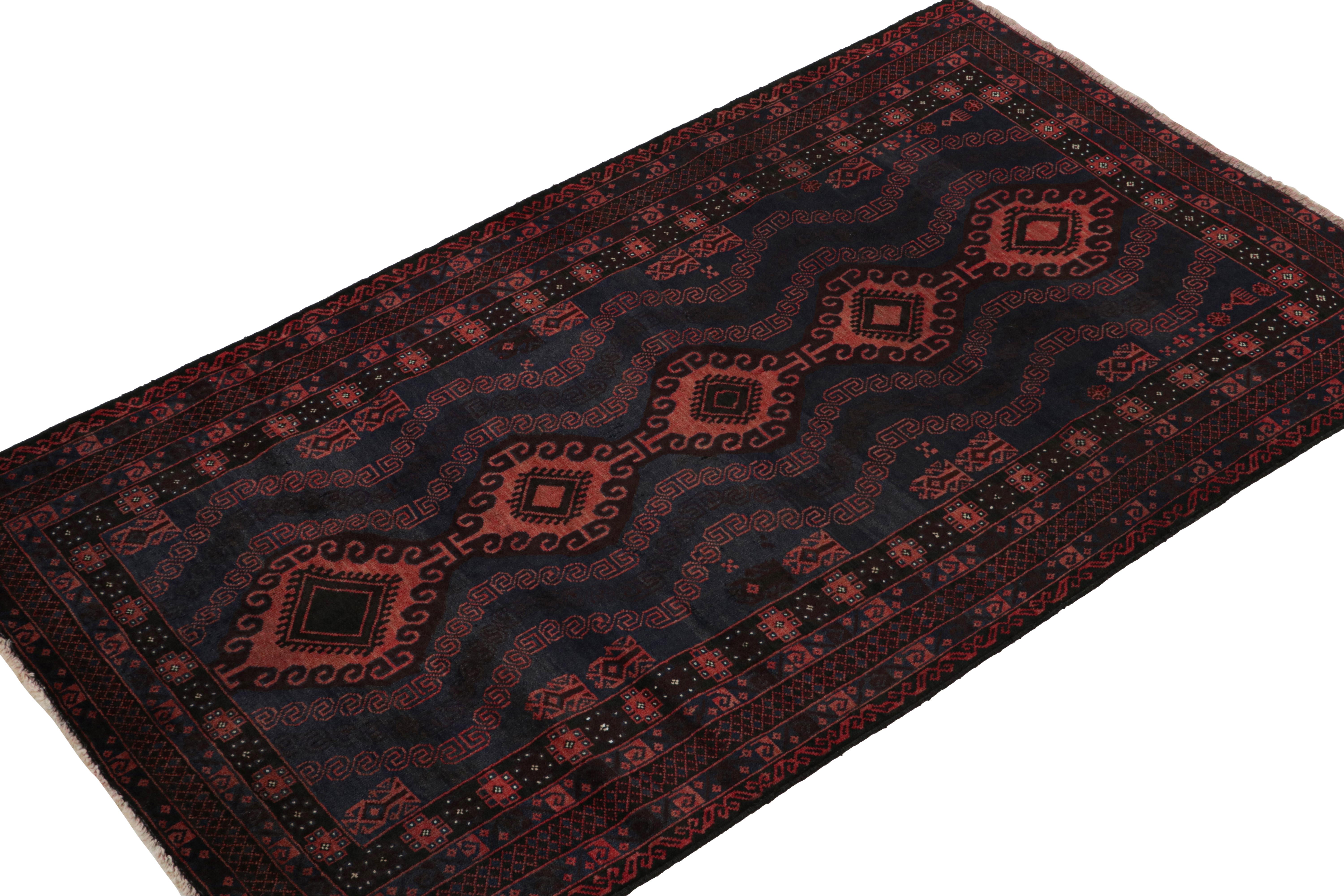 Hand-knotted in wool & goat hair, this vintage tribal rug of the 1950s is a coveted addition to Rug & Kilim’s Antique & Vintage collection. 

On the Design: 

Coming from the Baluch tribe, this 4x7 rug boasts patterns in rich tones of red, blue &