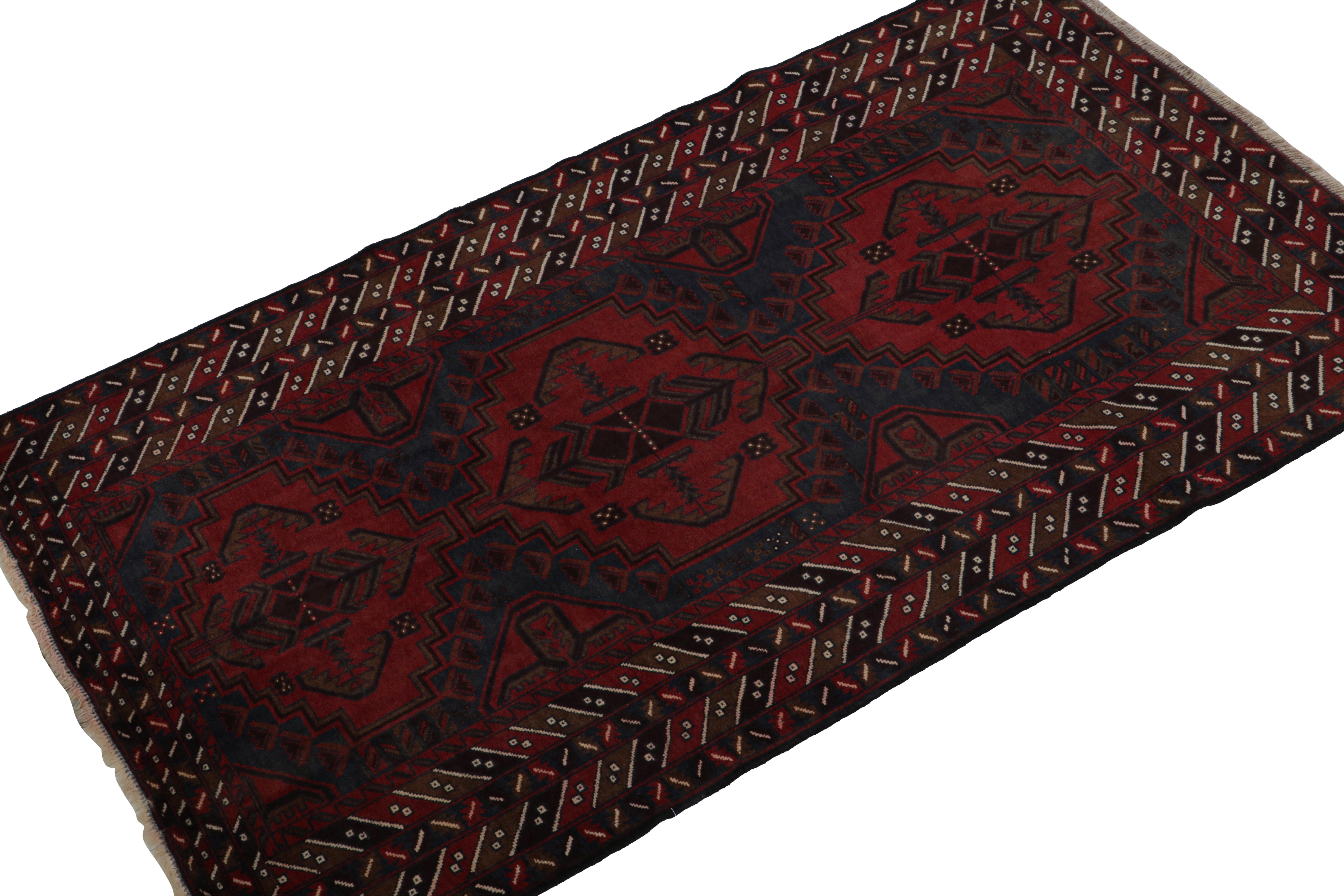 Hand-knotted in wool & goat hair, this vintage tribal rug of the 1950s is a coveted addition to Rug & Kilim’s Antique & Vintage collection. 

On the Design: 

Coming from the Baluch tribe, this 4x6 rug boasts patterns in rich tones of red, blue &