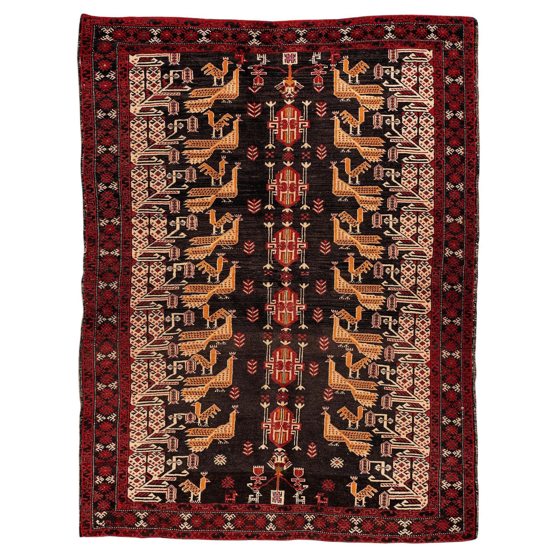 Vintage Baluch Stammesteppich mit Pfauenmotiven, schwarze und rote Wolle, 1950er Jahre im Angebot