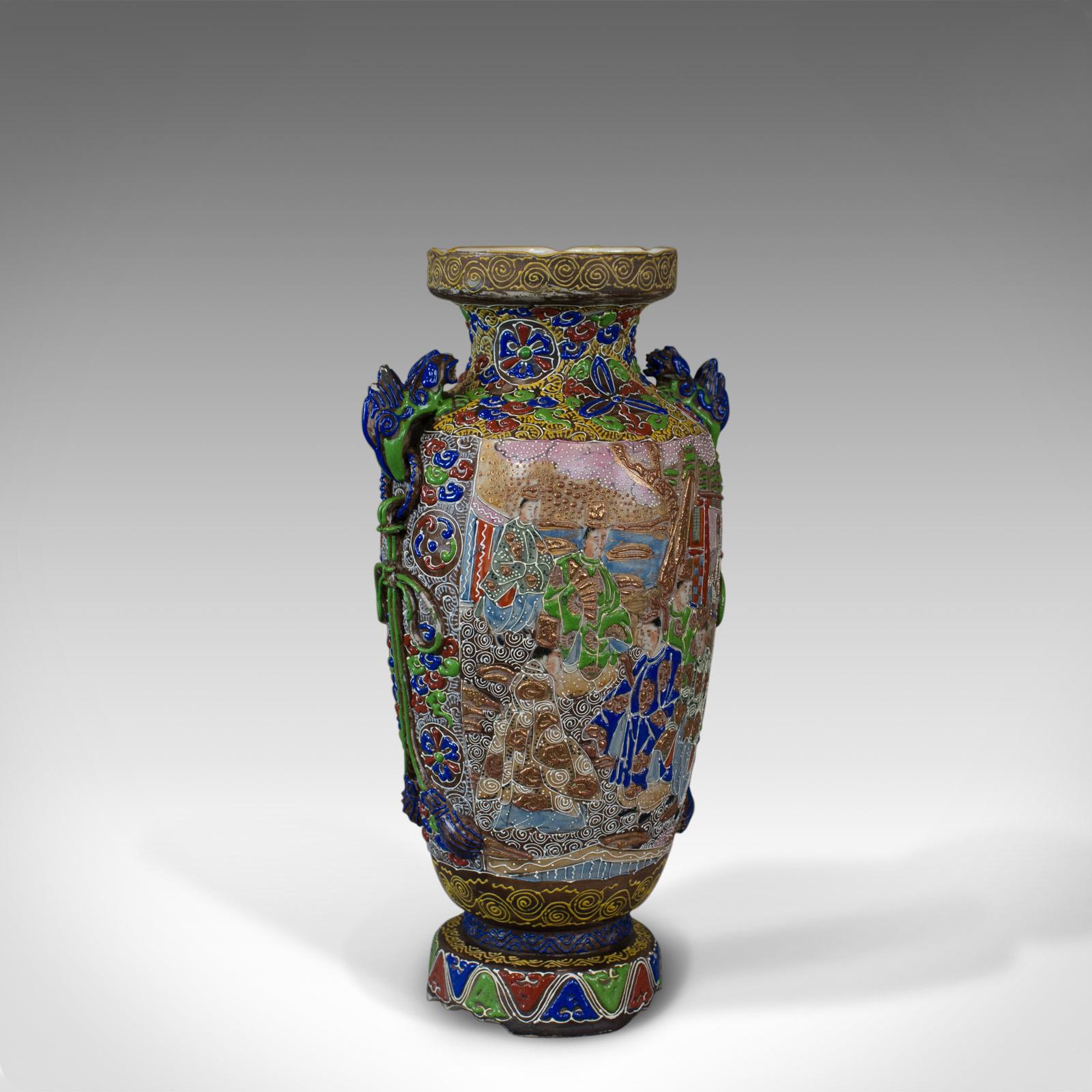 This is a vintage baluster vase. An oriental, highly decorative ceramic vessel dating to the mid-20th century.

Of Classic form and in good proportion
Of quality craftsmanship, free from damage
Maker's mark to the base which displays some