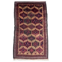 Tapis vintage Balutch avec médaillons étoilés tribaux en bourgogne et noir - 5'4" X 3