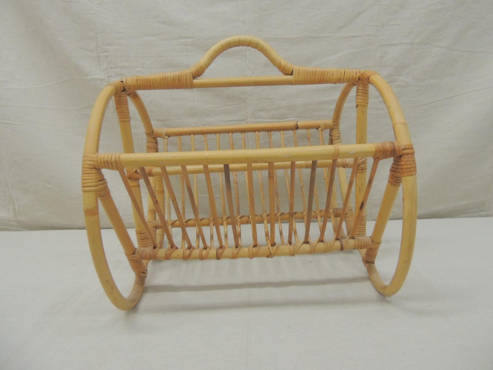 Vintage bamboo and rattan magazine holder or rack
(Hong Kong)
Size: 16”W X x 15” D x 16.5” H.
   