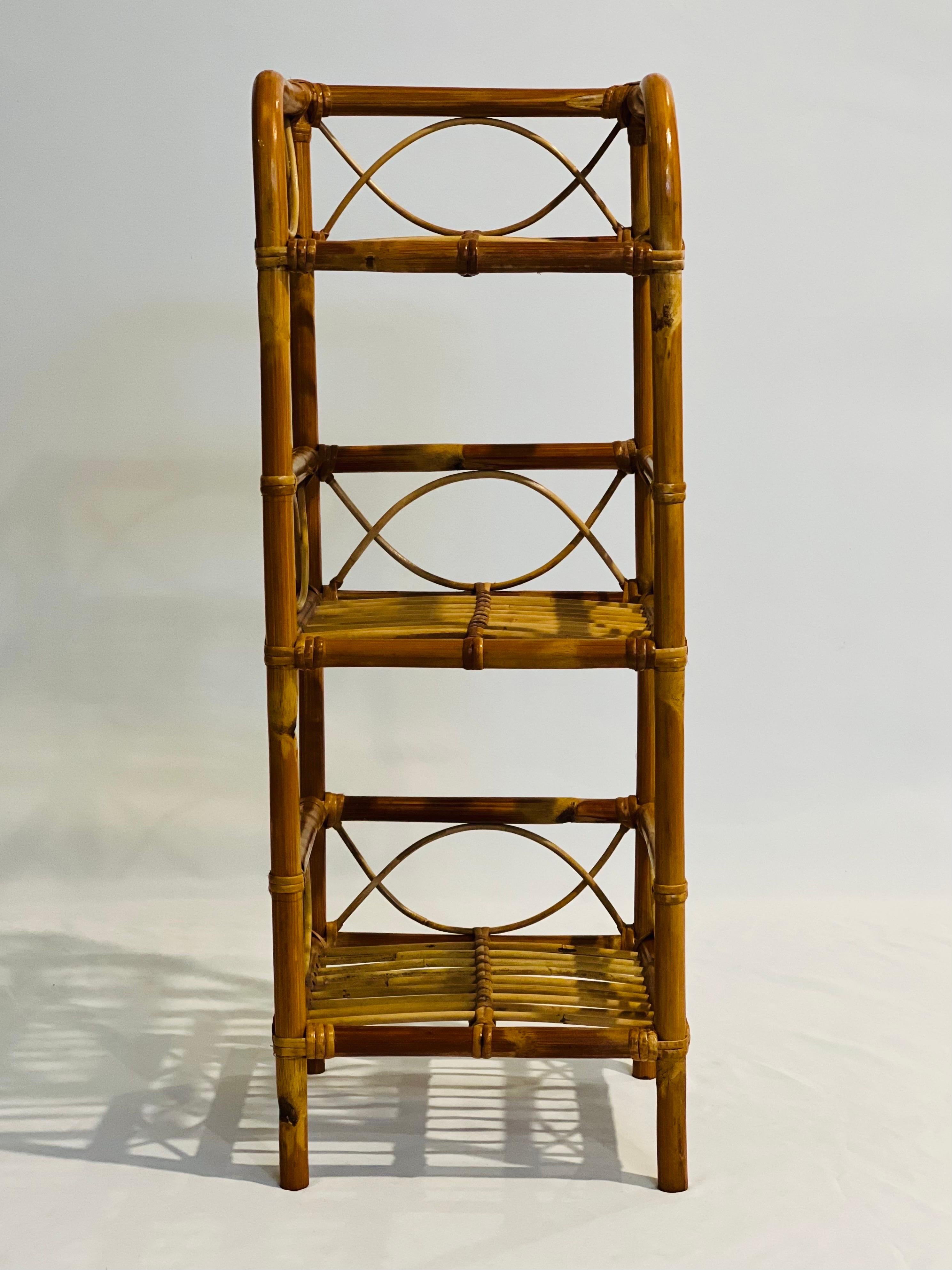 Vintage bamboo and rattan petite étagère.

Charming three tier open shelving perfect for plants, books or displaying small items. Lovely details, sturdy and in very good condition.