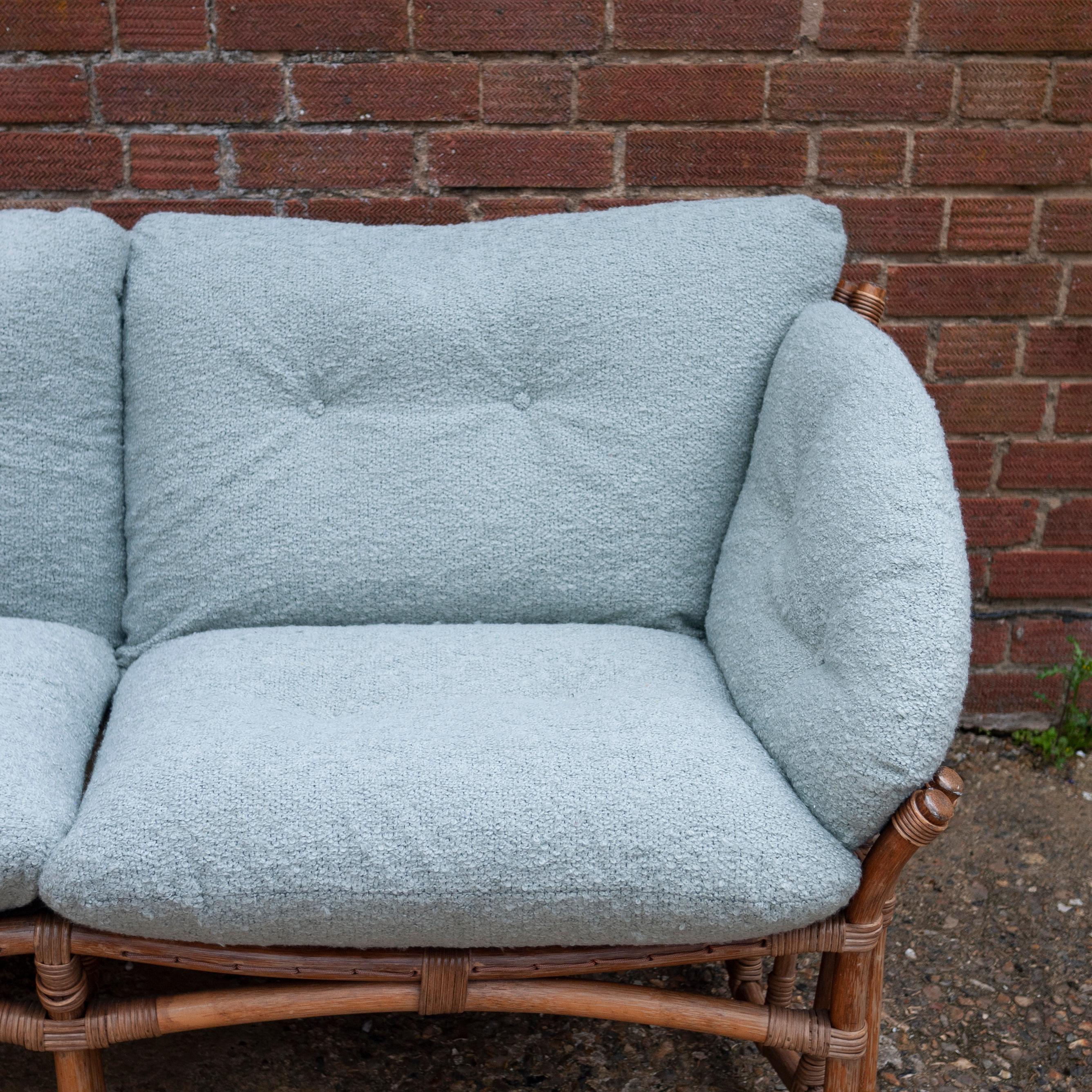 A vintage bamboo sofa with newly upholstered boucle fabric.

Manufacturer - Unknown

Design Period - 1970 to 1979

Attribution Marks - n/a

Style - Vintage, Mid-Century

Detailed Condition - Good in keeping with age and use.

Restoration