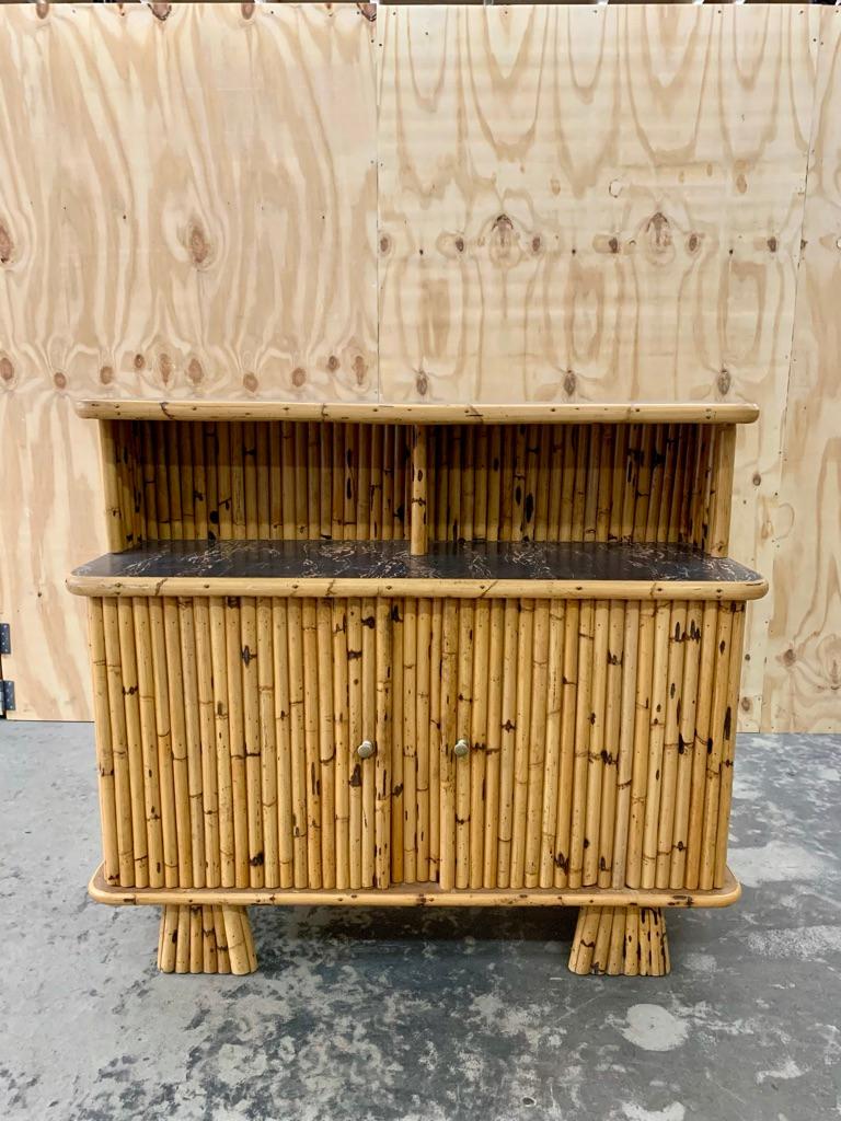 Cool vintage French 1950s bar or cupboard with linoleum table tops. Great for the kitchen, dining room or living room.