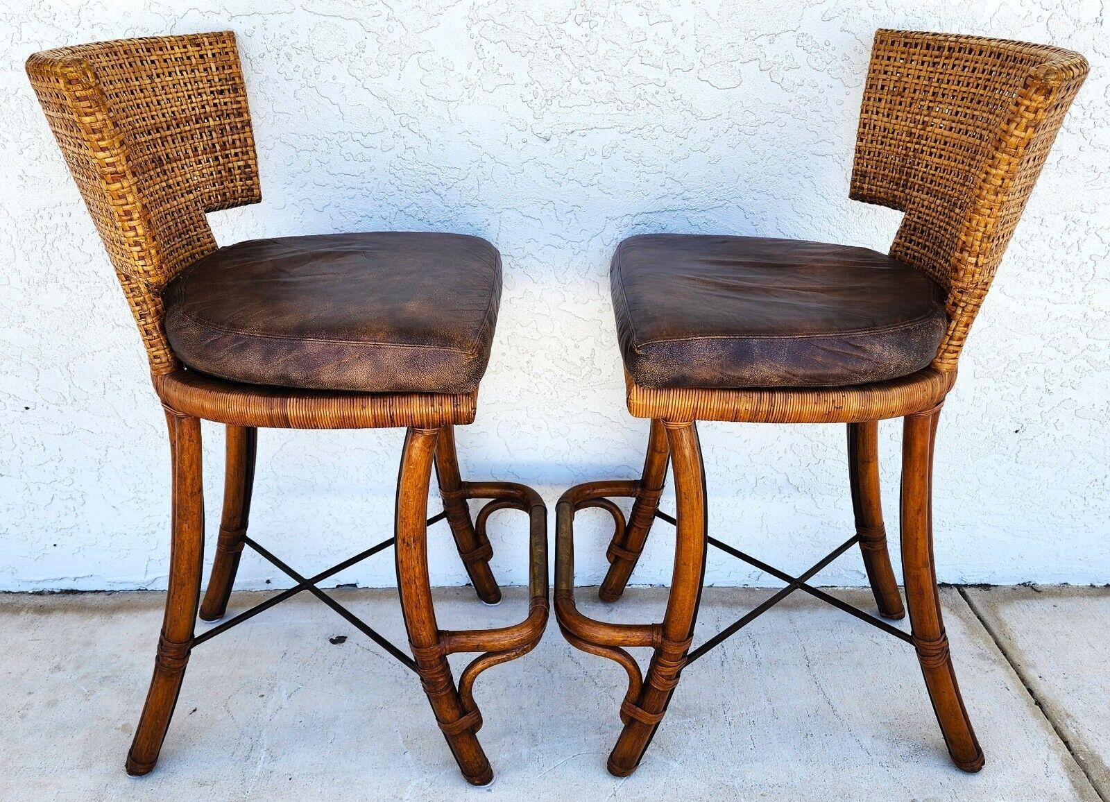 For FULL item description click on CONTINUE READING at the bottom of this page.

Offering One Of Our Recent Palm Beach Estate Fine Furniture Acquisitions Of A 
Pair of Vintage Kreiss (attributed) Bamboo Barstools with Double Caned Backs, Top Grain