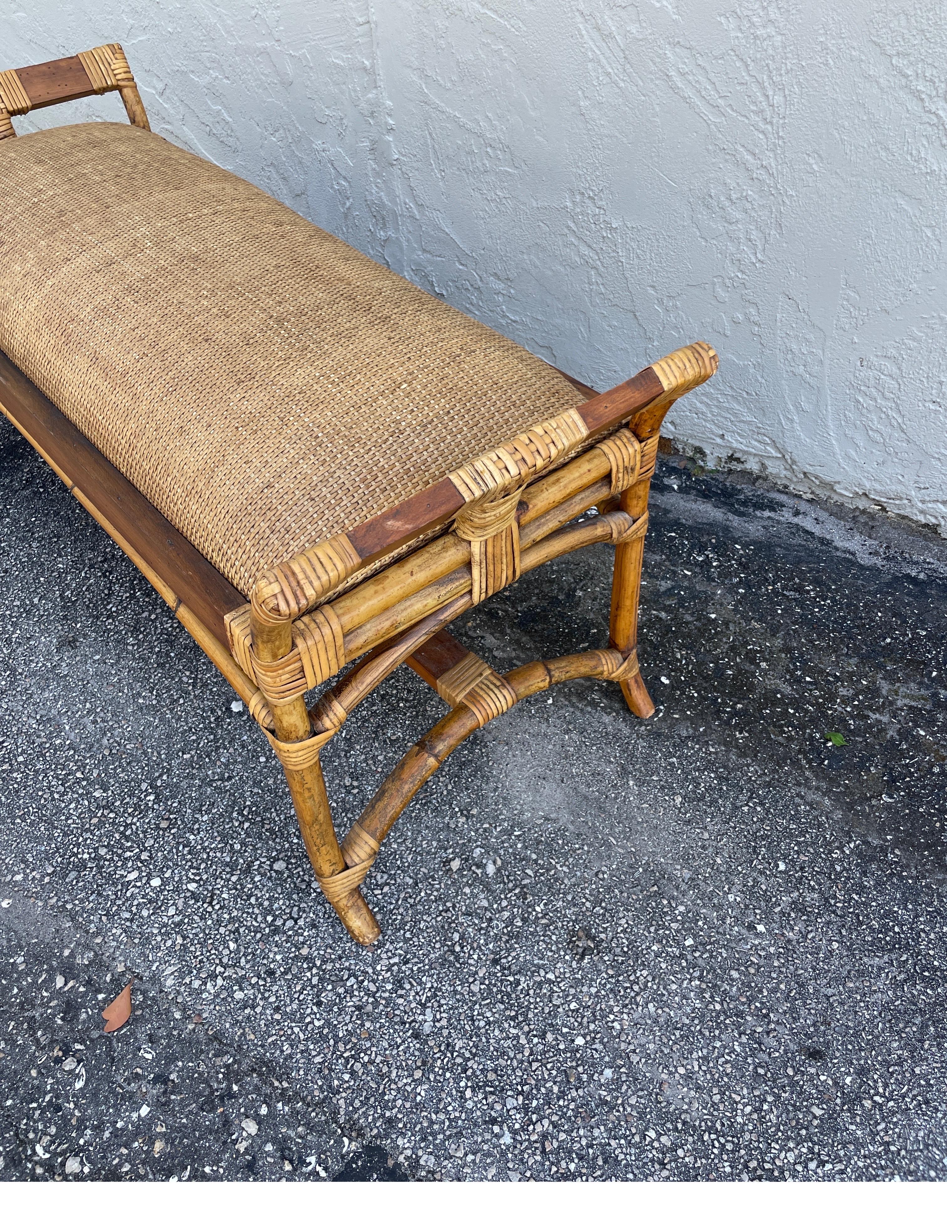 Vintage Bamboo bench with a padded seat cushion. Very well constructed and sturdy,