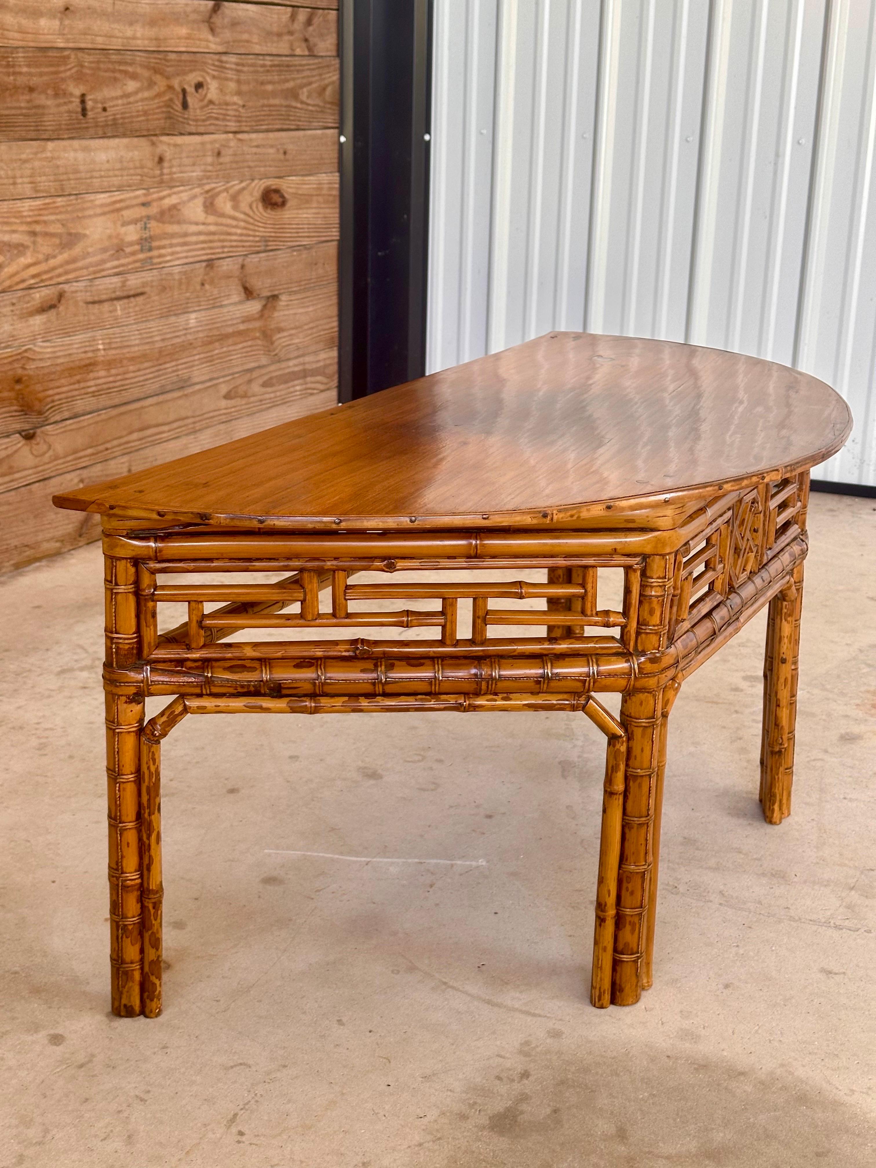 British Colonial Vintage Bamboo Chinese Style Demi-Lune Center Table with Open Fretwork Design For Sale