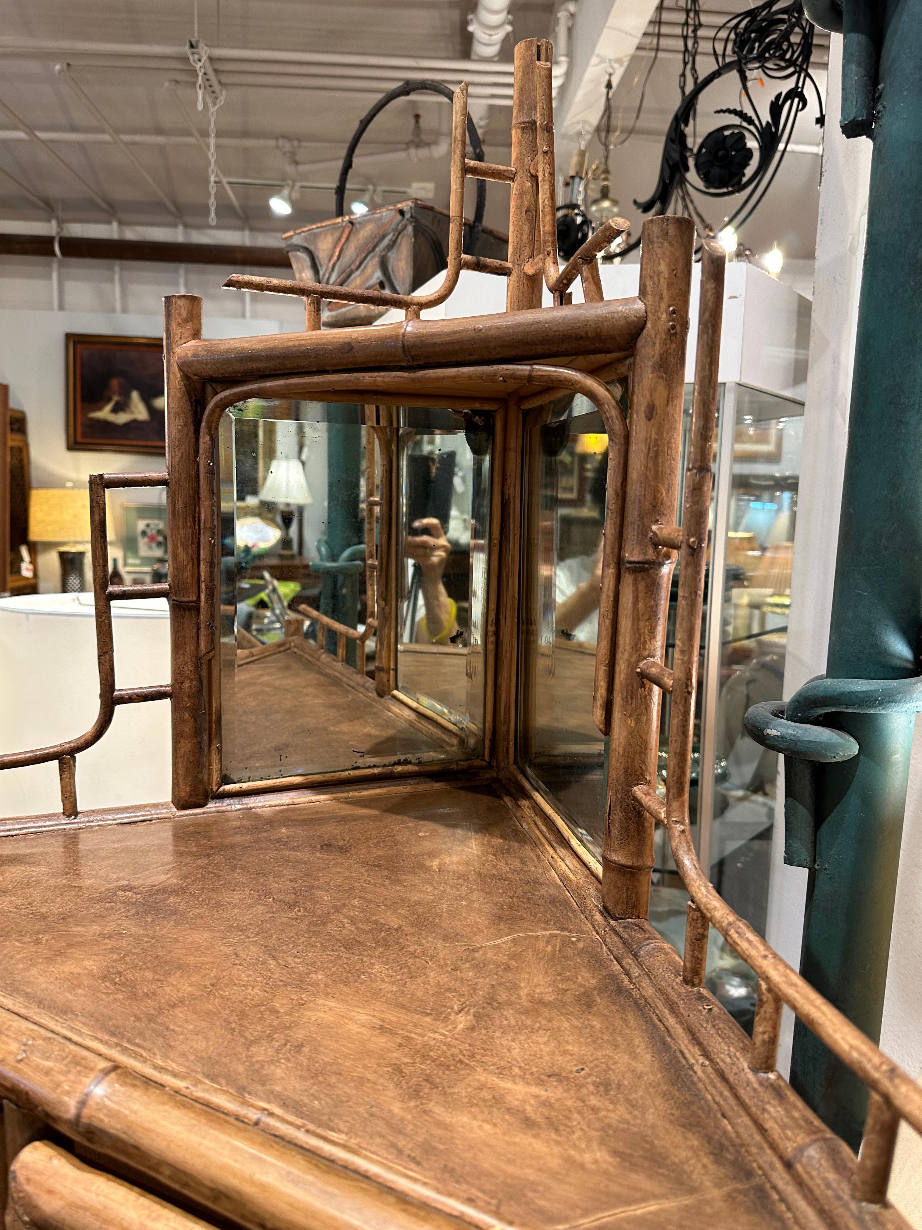 Very decorative fine English  bamboo corner  display cabinet.   Etagere style 
 with open shelves  and glass door cabinet with over corner bevel mirrors..