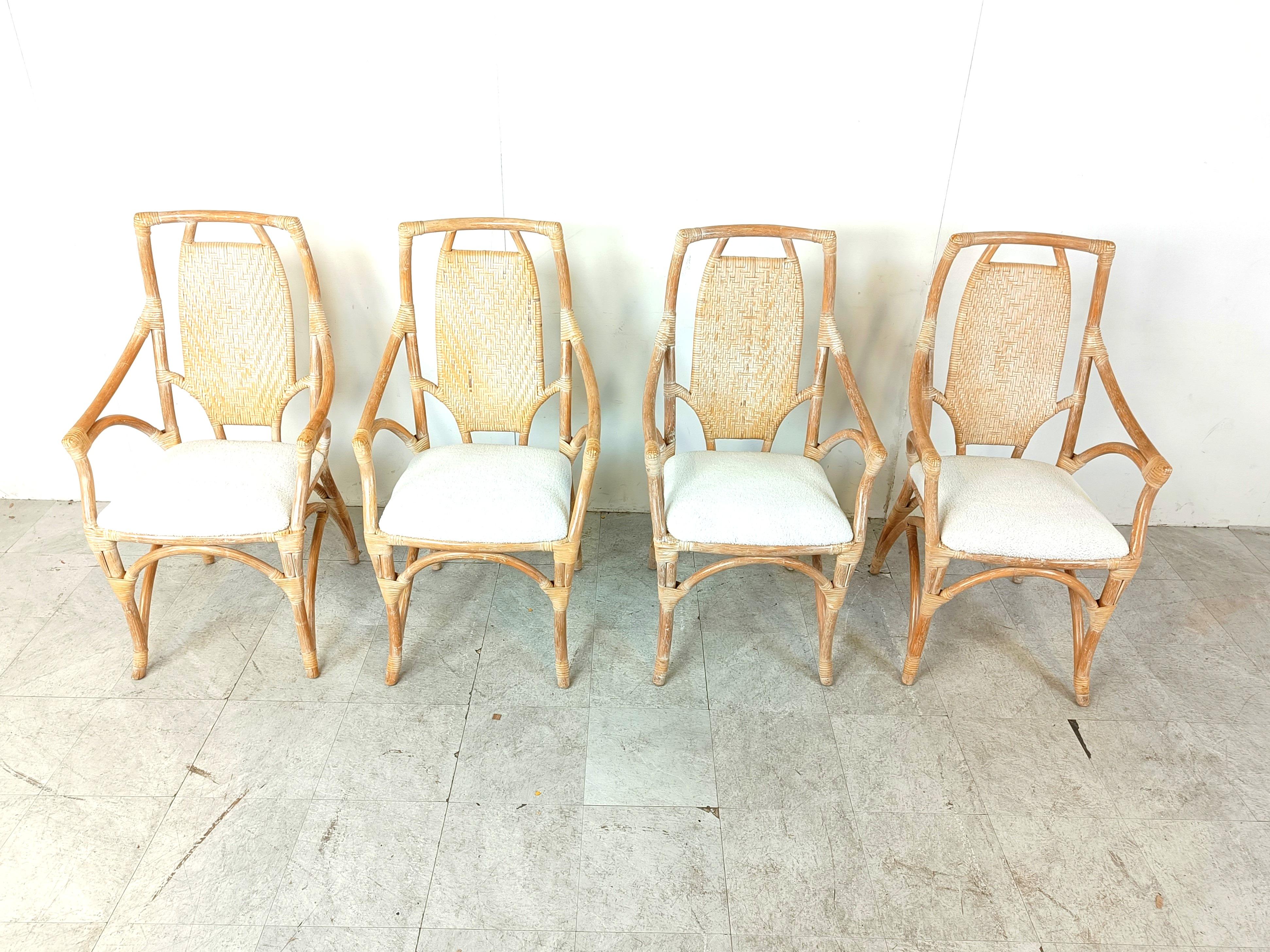 Elegant vintage bamboo dining chairs newly upholstered with white bouclé fabric with a webbing backrest.

Timeless and decorative pieces.

Good condition.

1960s - France

Height: 107cm
Width: 60cm
Depth: 50cm
Seat Height: 50cm

Ref.: 305022