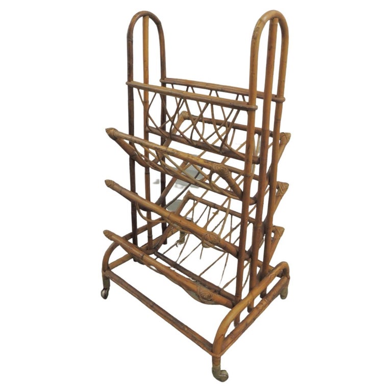 https://a.1stdibscdn.com/vintage-bamboo-library-magazines-and-newspapers-holder-stand-for-sale/f_9463/f_308900221666035864145/f_30890022_1666035864485_bg_processed.jpg?width=768