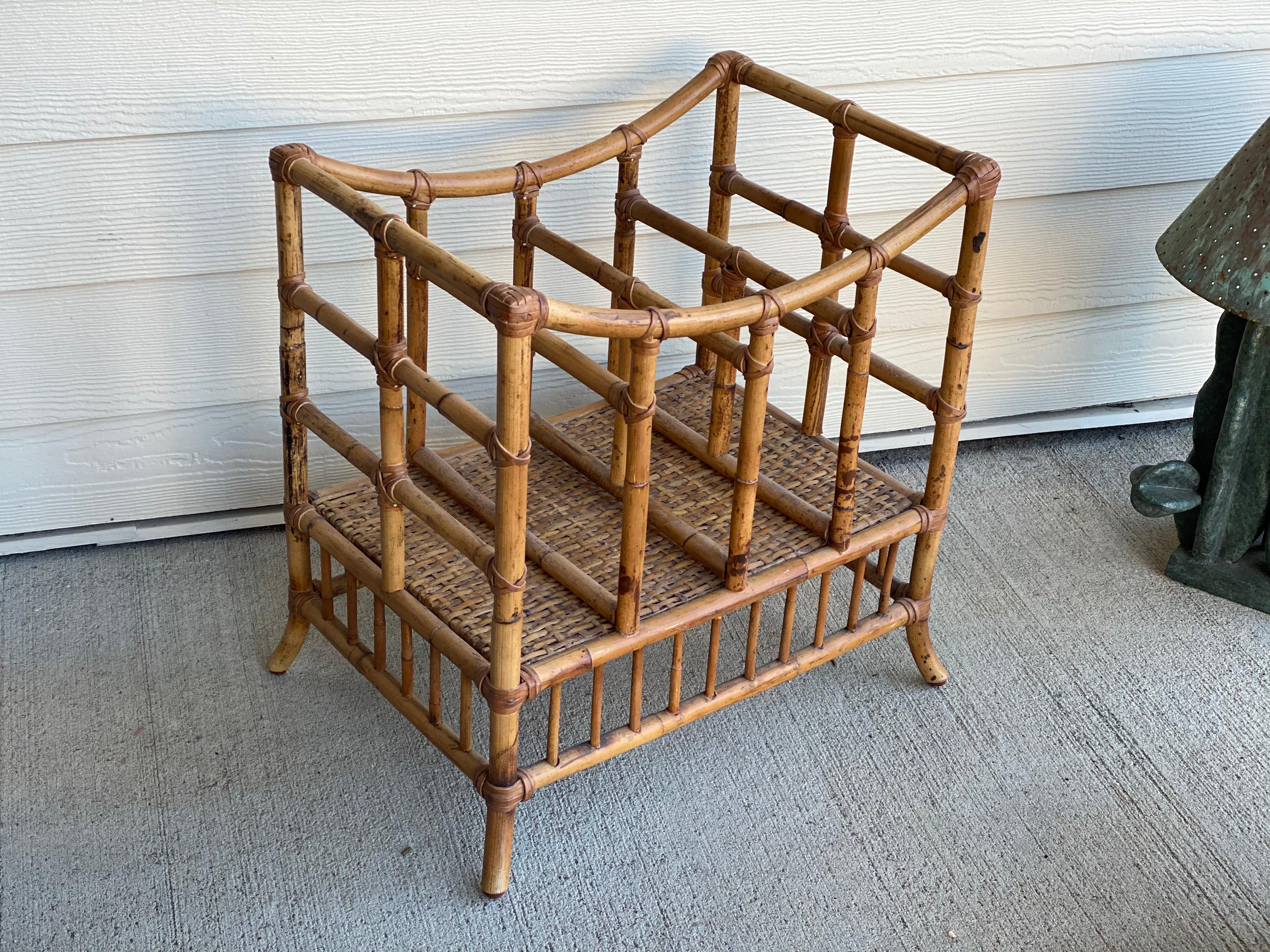 Vintage bamboo magazine rack stand.
Four areas of storage. Bamboo and weaving in good condition
Measures: 20