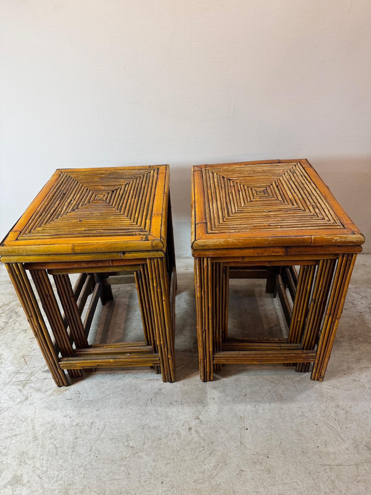 Elevate your space with this charming set of three vintage bamboo and rattan nesting tables. Featuring handwoven geometric lattice tabletops and a sturdy bamboo frame, these tables exude an effortless boho, coastal, and mid-century modern appeal.