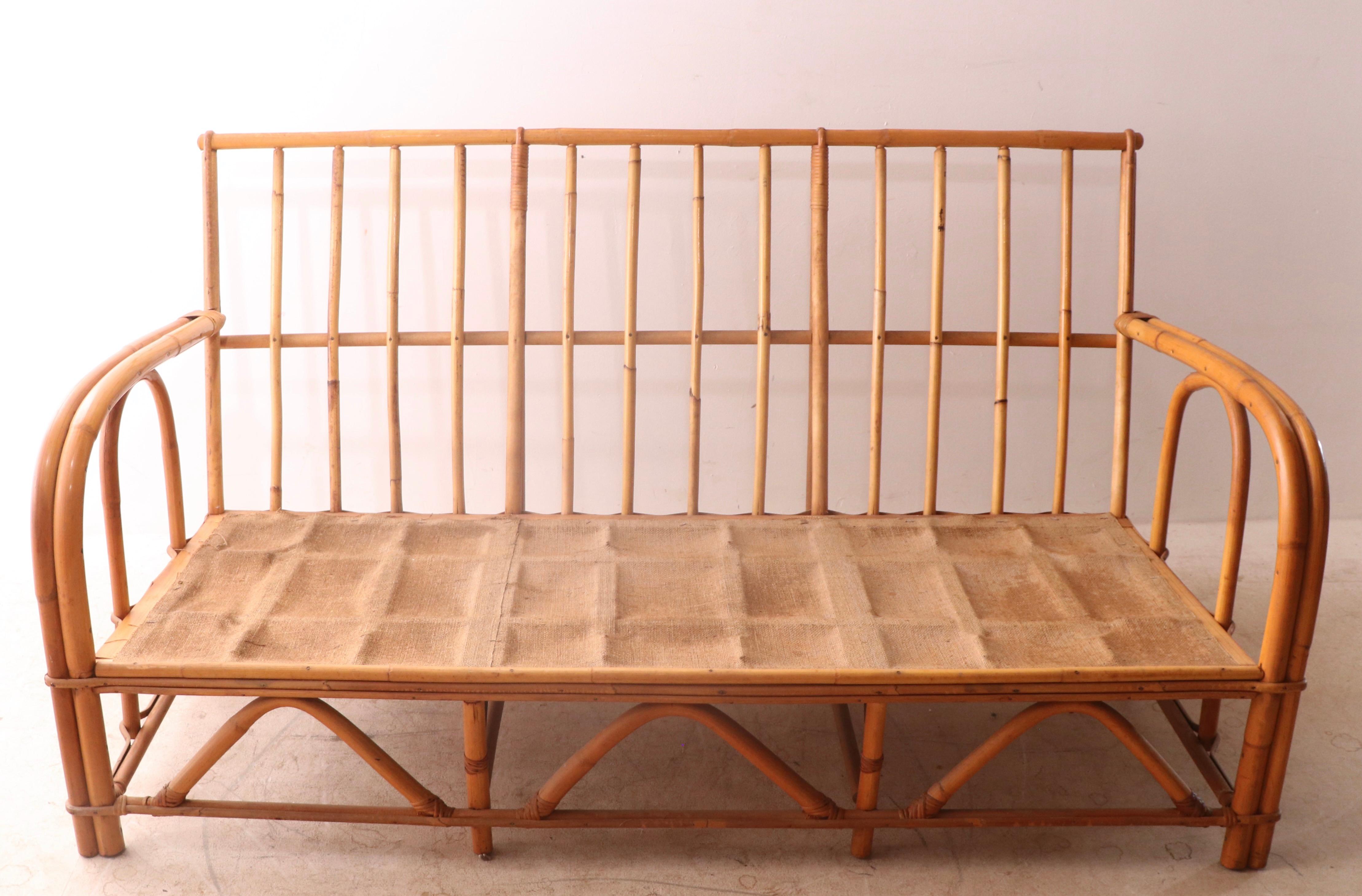 Nice bamboo frame sofa, with loose cushion upholstery. The sofa was made by noted NYC maker Superior Reed and Rattan Furniture Co. NYC circa 1960-1980. This example is structurally sound and sturdy, the frame is clean and ready to use, the cushions