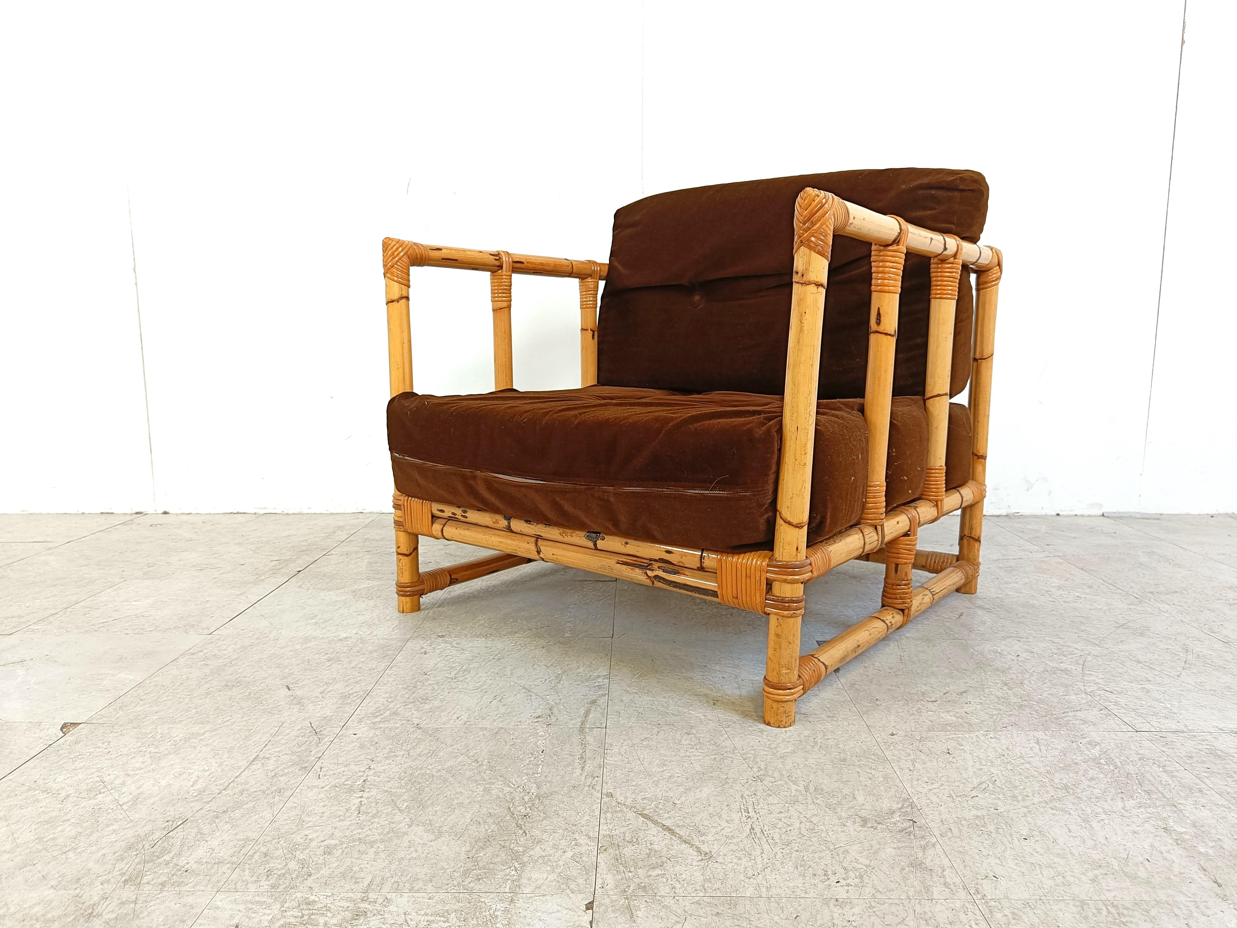 Vintage bamboor armchair with a comfortable brown fabric tufted cushion.

Beautiful timeless piece with which adds a nice bohemian touch to your home.

Good condition

1970s - Belgium

Height: 75cm/29.52