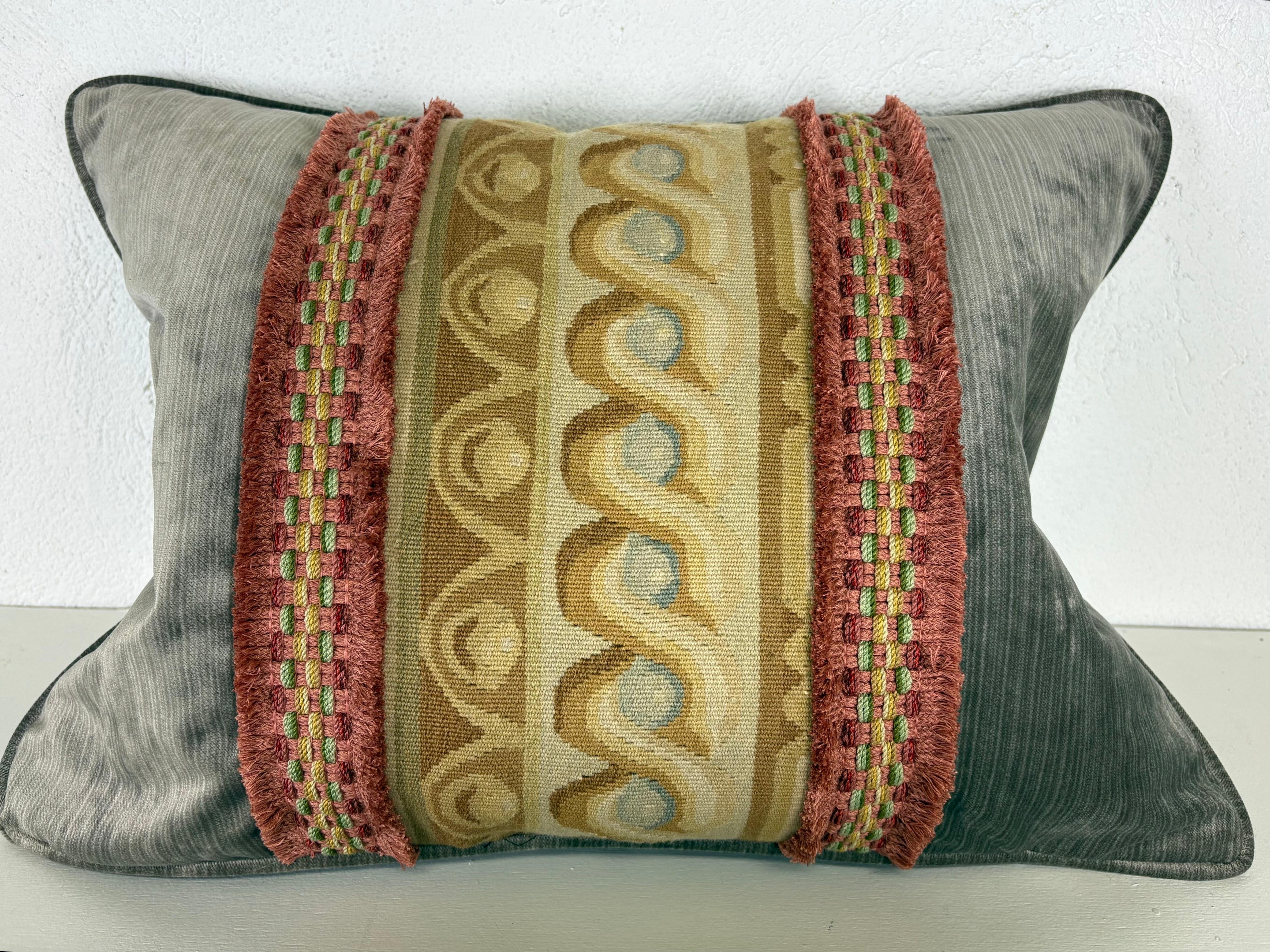 This is a Aubusson tapestry and plush gray velvet banded pillow. This vintage tapestry has been paneled between a French gray plush velvet and banded with a salmon colored brocade. Pillows are newly made in house using vintage and new fabrics and