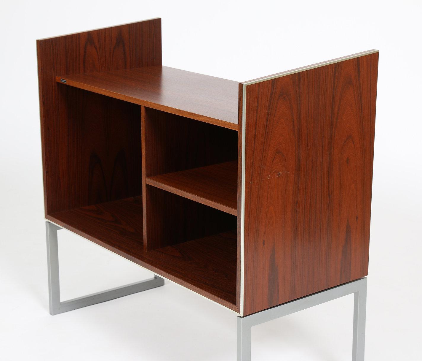 Here is a vintage Bang and Olufsen rosewood hi-fi cabinet designed by Jacob Jensen. Made in Denmark, probably circa 1970s-80s. It is finished on all sides, so it can be placed against a wall or floated in a room. There are four original adjustable