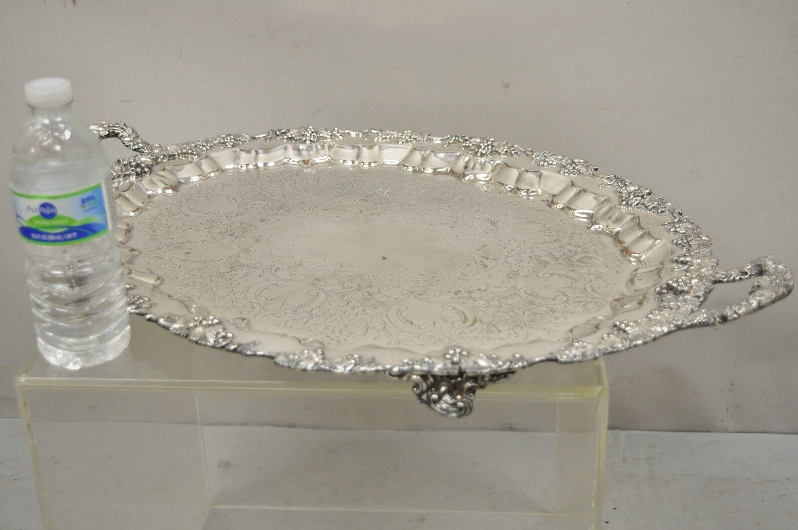 Vintage Barbour HBEP Silverplated Victorian Style Grapevine oval platter tray. Item listed is raised on ornate feet, ornate twin handles, grapevine pattern, engraved center, very nice vintage item. Circa Early to Mid 1900s. Measurements: 2
