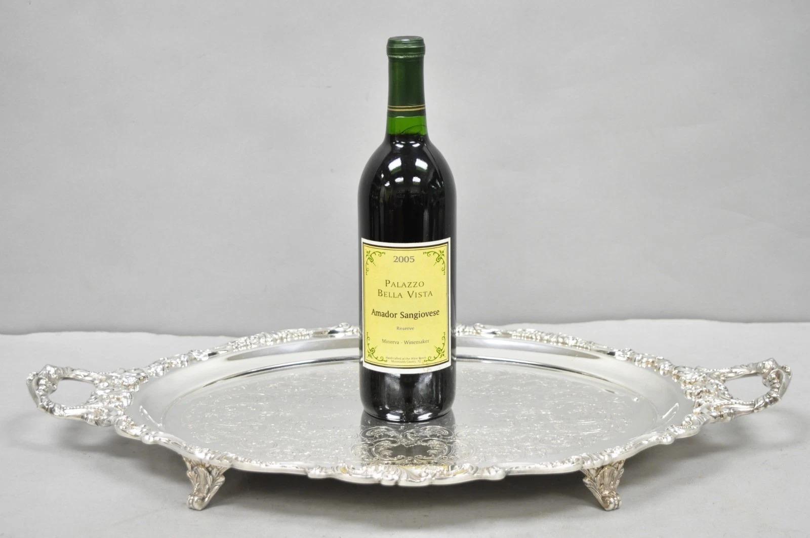 Vassoio ovale da bar d'epoca placcato in argento Baroque by Wallace 293F. Circa metà del XX secolo. Misure: 2