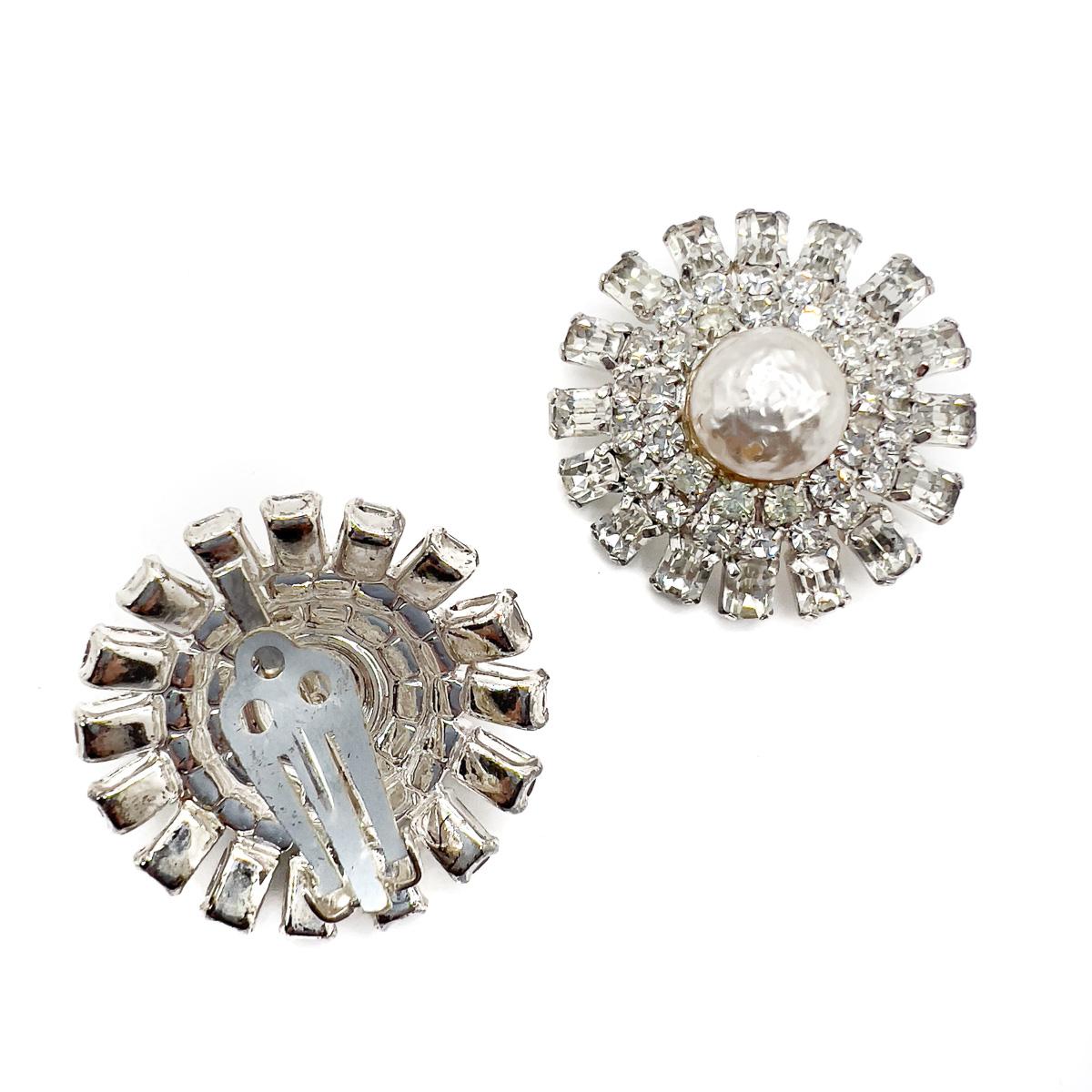 A pair of Vintage Pearl & Baguette Crystal Earrings. With a vibe of the silver screen, full of glamour and timelessly feminine, these earrings with their baroque pearls and baguette cut crystals will undoubtedly prove a style hero in your jewel