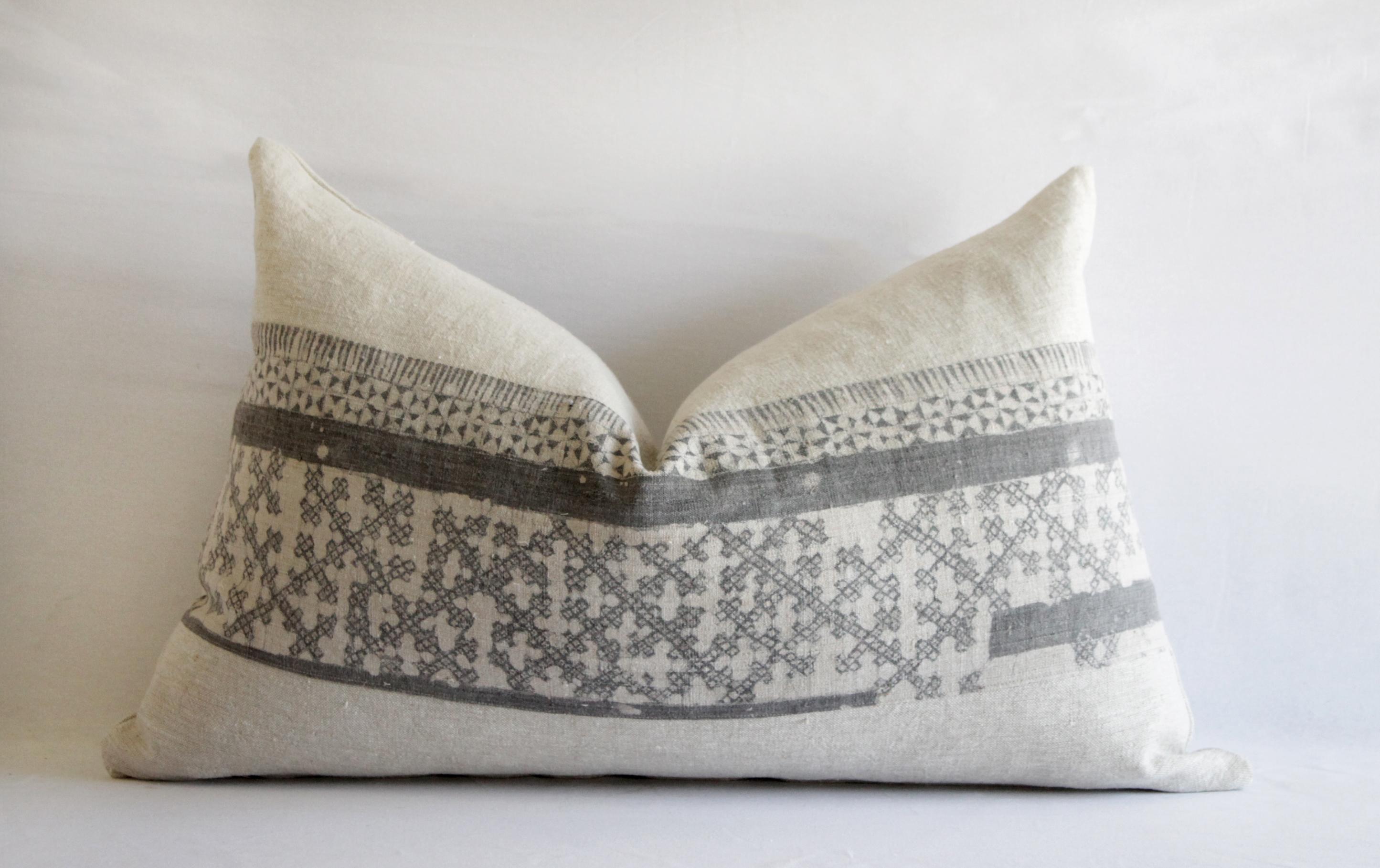 Only one left. 
Vintage batik and linen custom made pillow. The body of the pillow is 100% pure Belgian flax linen, with a vintage or antique Chinese textile center. The center band is a beautiful textured fabric in a soft grey and off white tone.