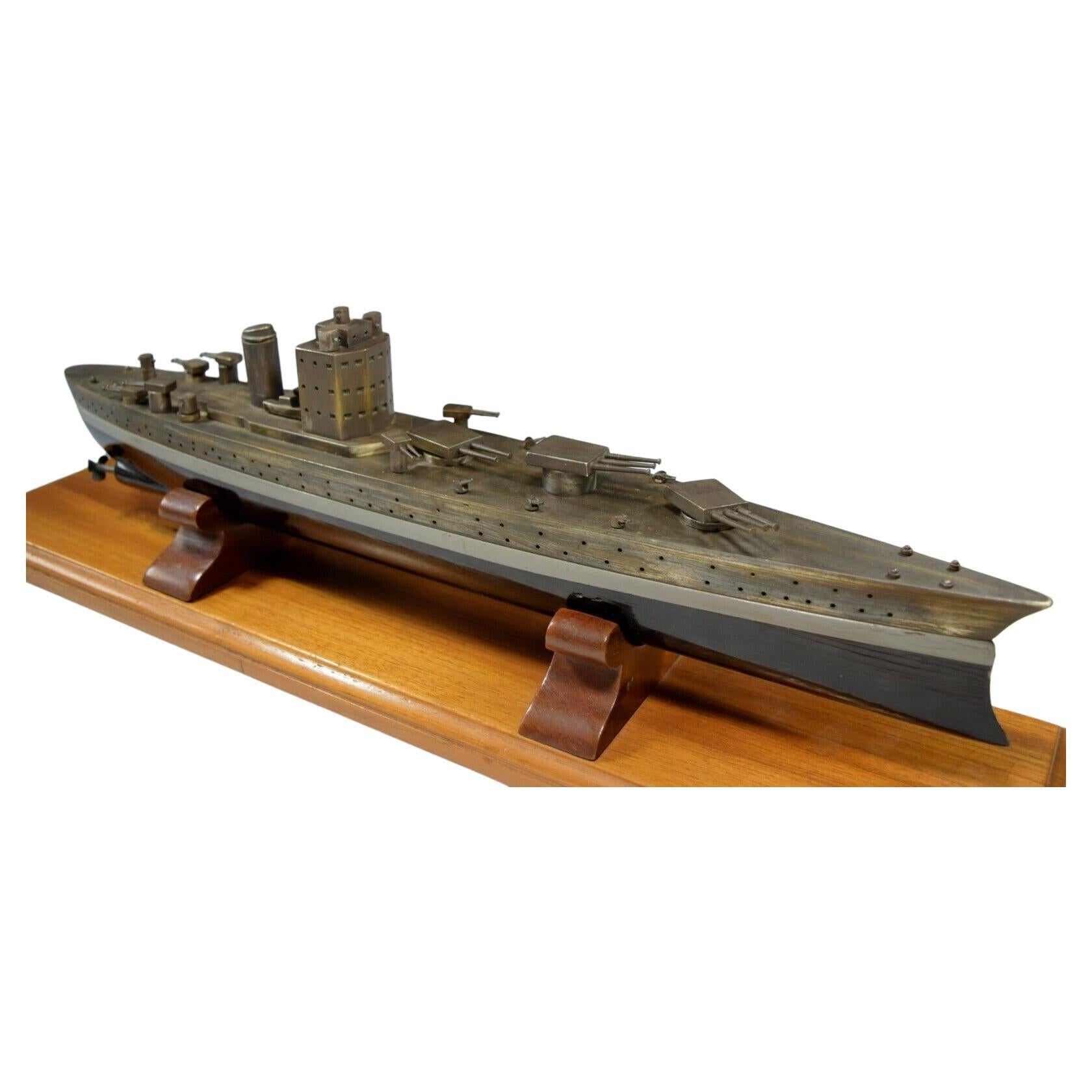 Exceptional Battleship Model,  HMS Nelson, made of bronze or brass and wood. This is a big model, and believed to be of  the HMS Nelson or a Nelson class battleship, which were built in 1923 & used during the World War II. The guns swivel along with