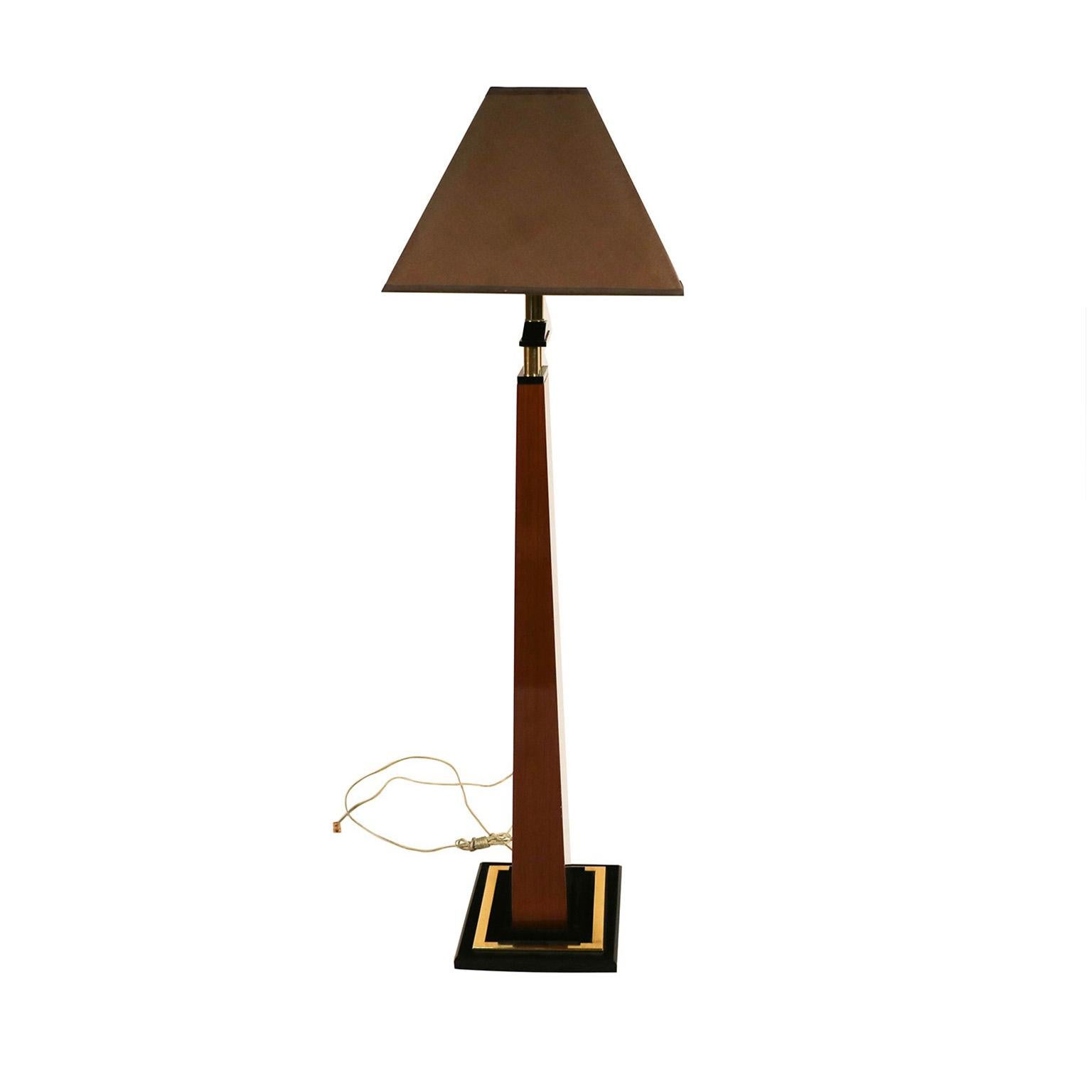 This is absolutely an extraordinary floor lamp by Bauer Lamp Company in an Empire Revival style, superior craftsmanship. Features a tall narrow wooden stem tapering to the top, with three short brass tubes supporting an electric fitting, raised on a