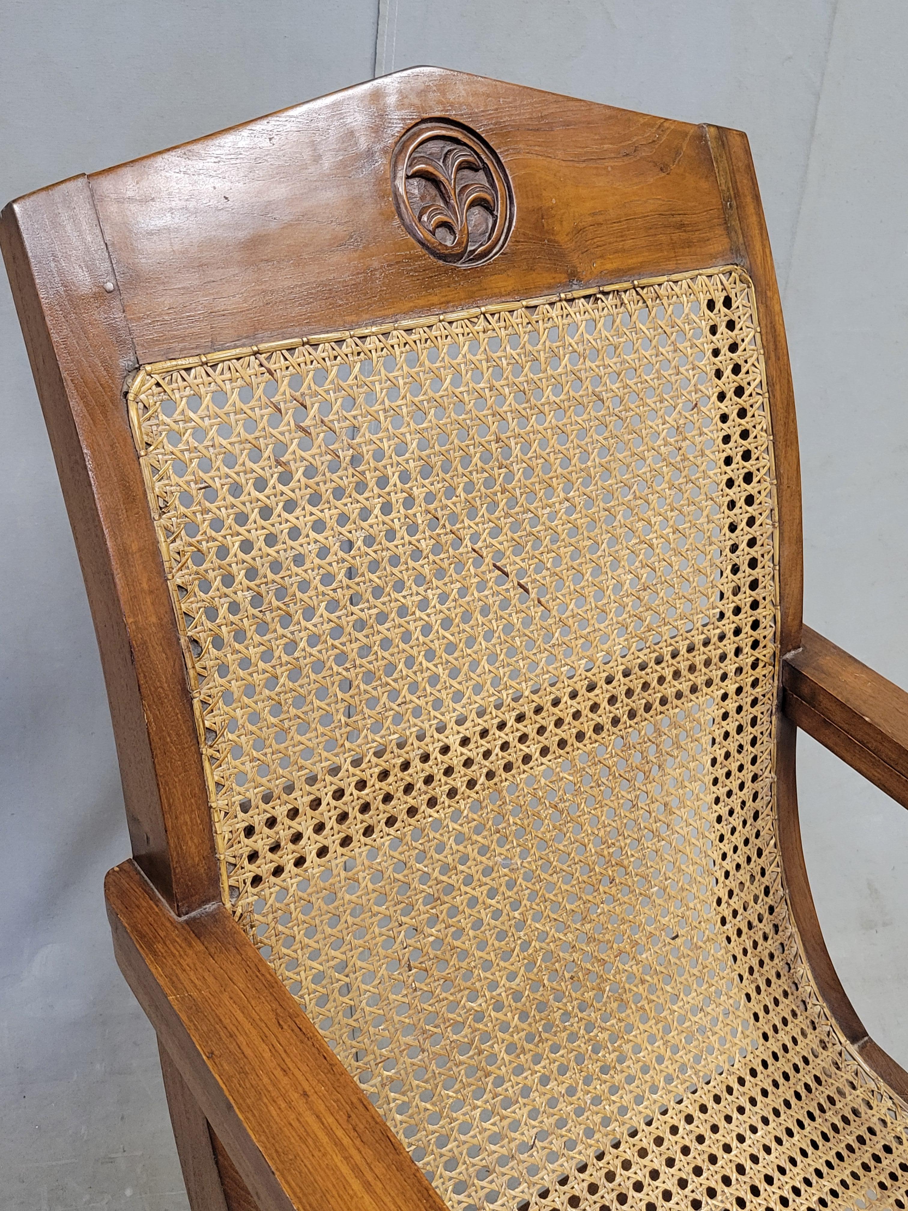 Indonesian Vintage Bauer International Teak Caned Plantation Chair With Extension Armrests For Sale