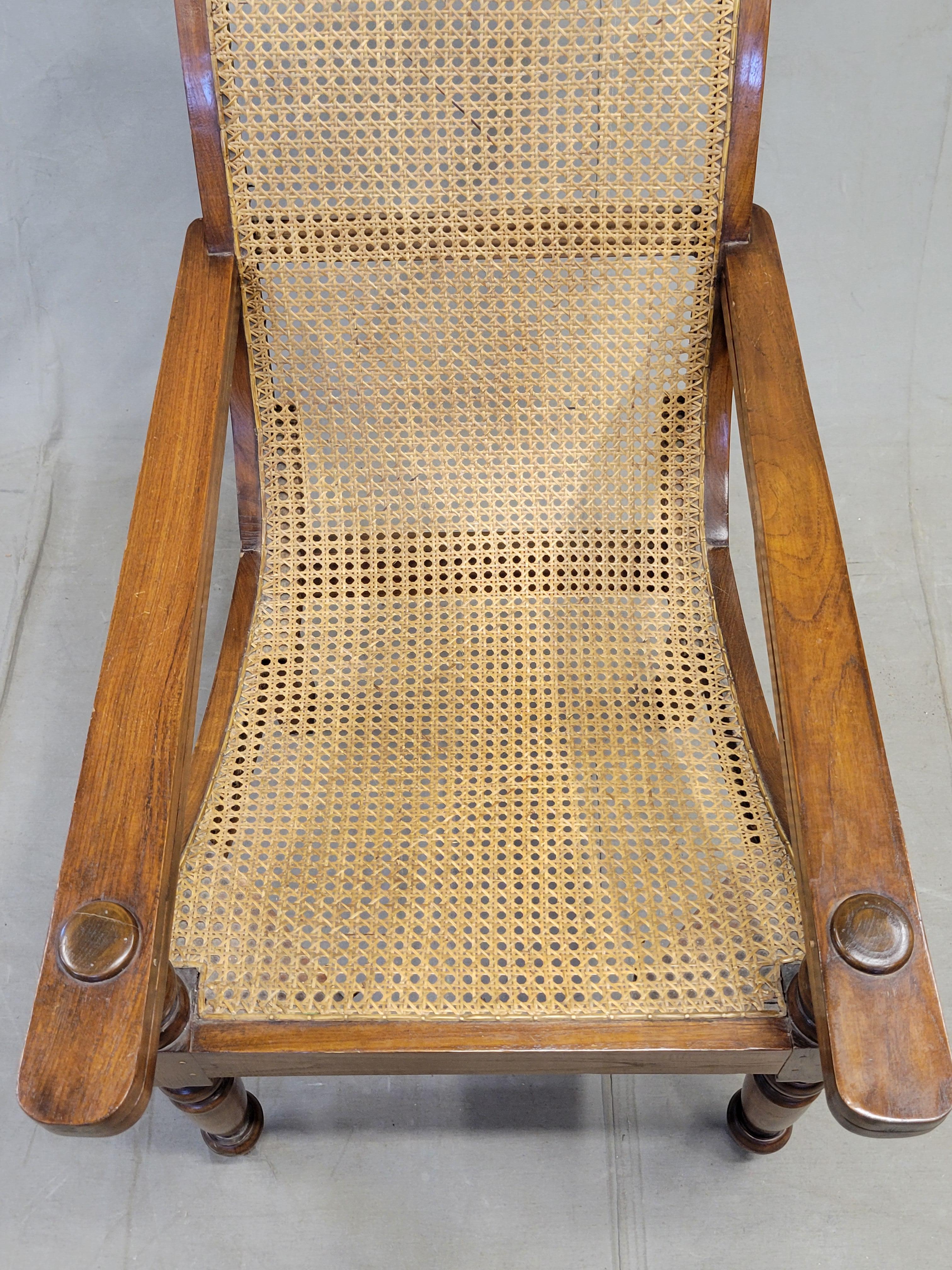 Vintage Bauer International Teak Caned Plantation Chair With Extension Armrests In Good Condition For Sale In Centennial, CO