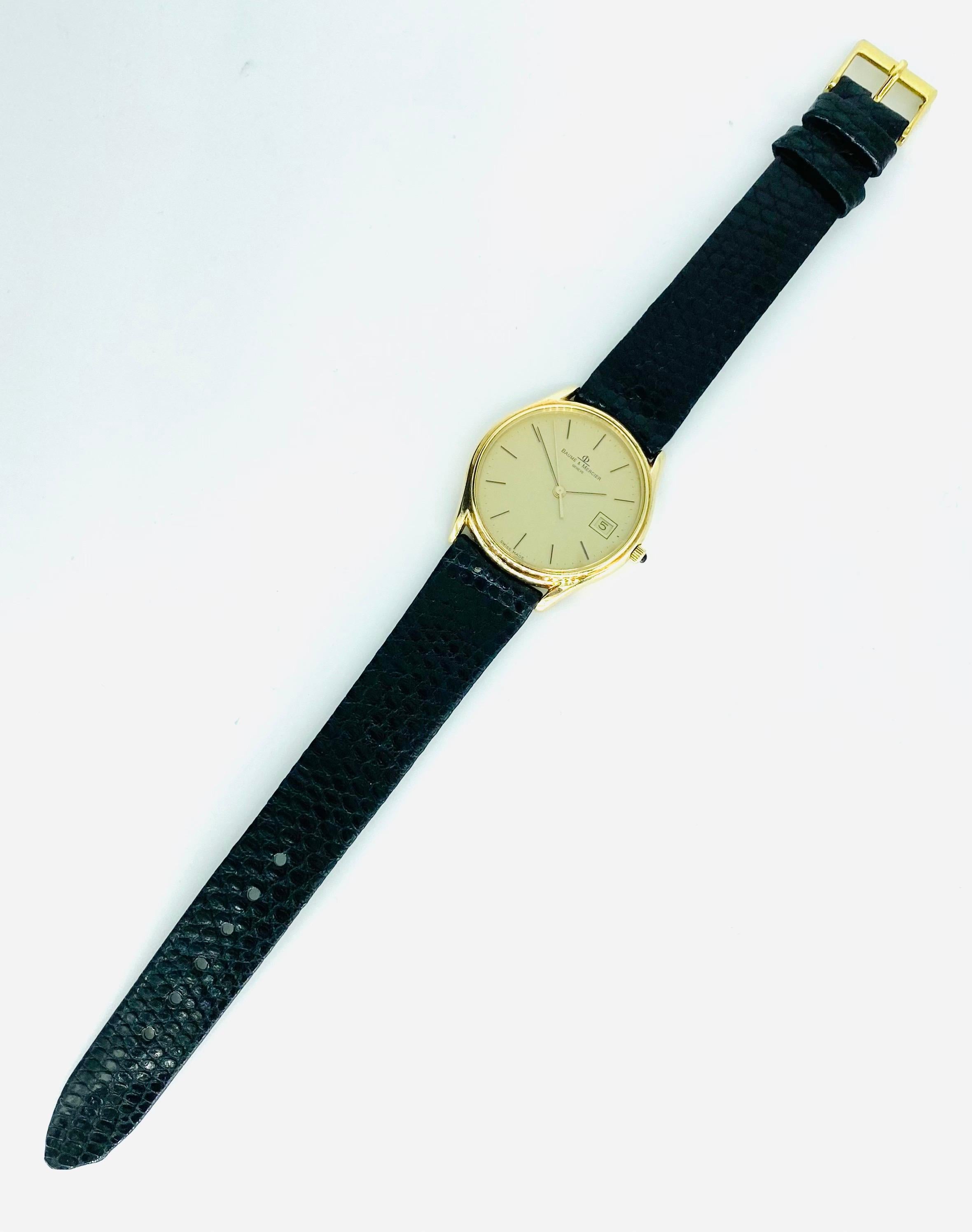 Vintage Bauer & Mercier Geneve 34mm 14k Gold Date Wristwatch. Le boîtier et le fond de la montre sont en or 14k. Bracelet neuf (la boucle n'est pas dorée). La montre mesure 34 mm, couronne comprise. Très élégante montre de tous les jours par nul