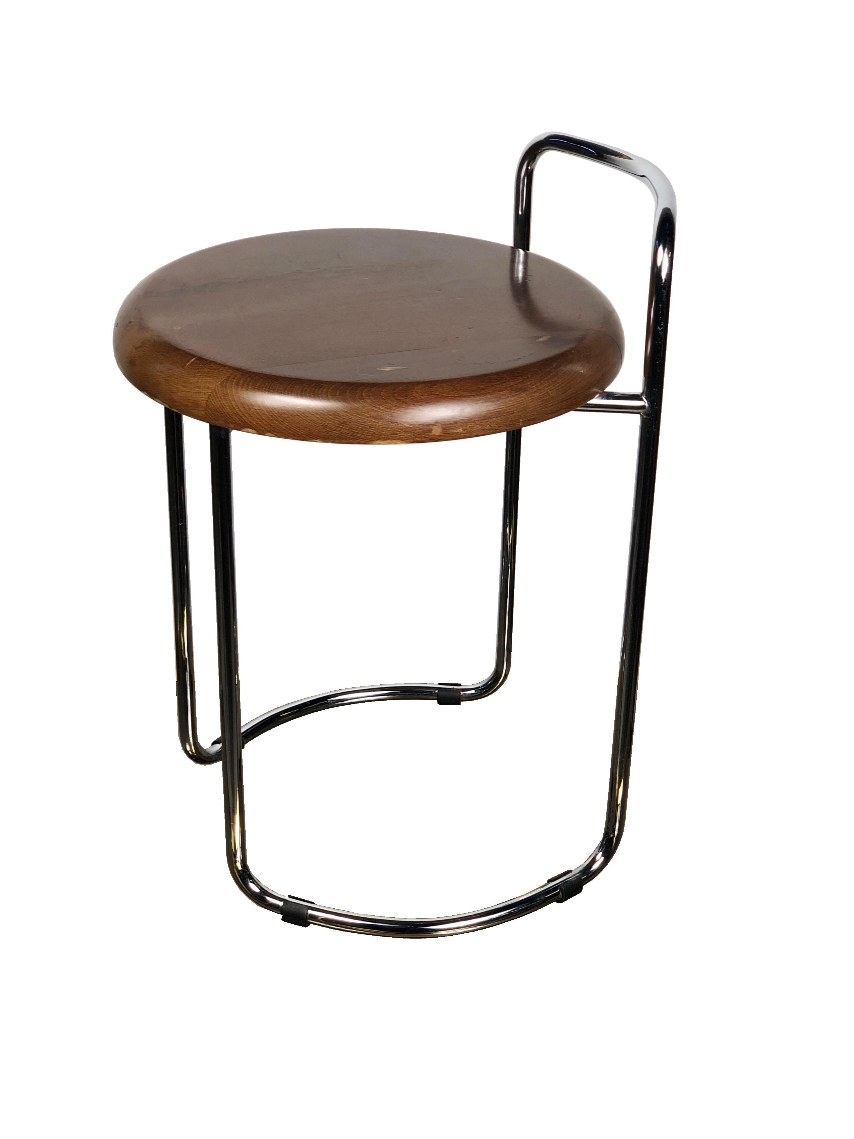 Vintage Bauhaus stool with a tubular chrome base and a wooden seat. Italy, 1960s.