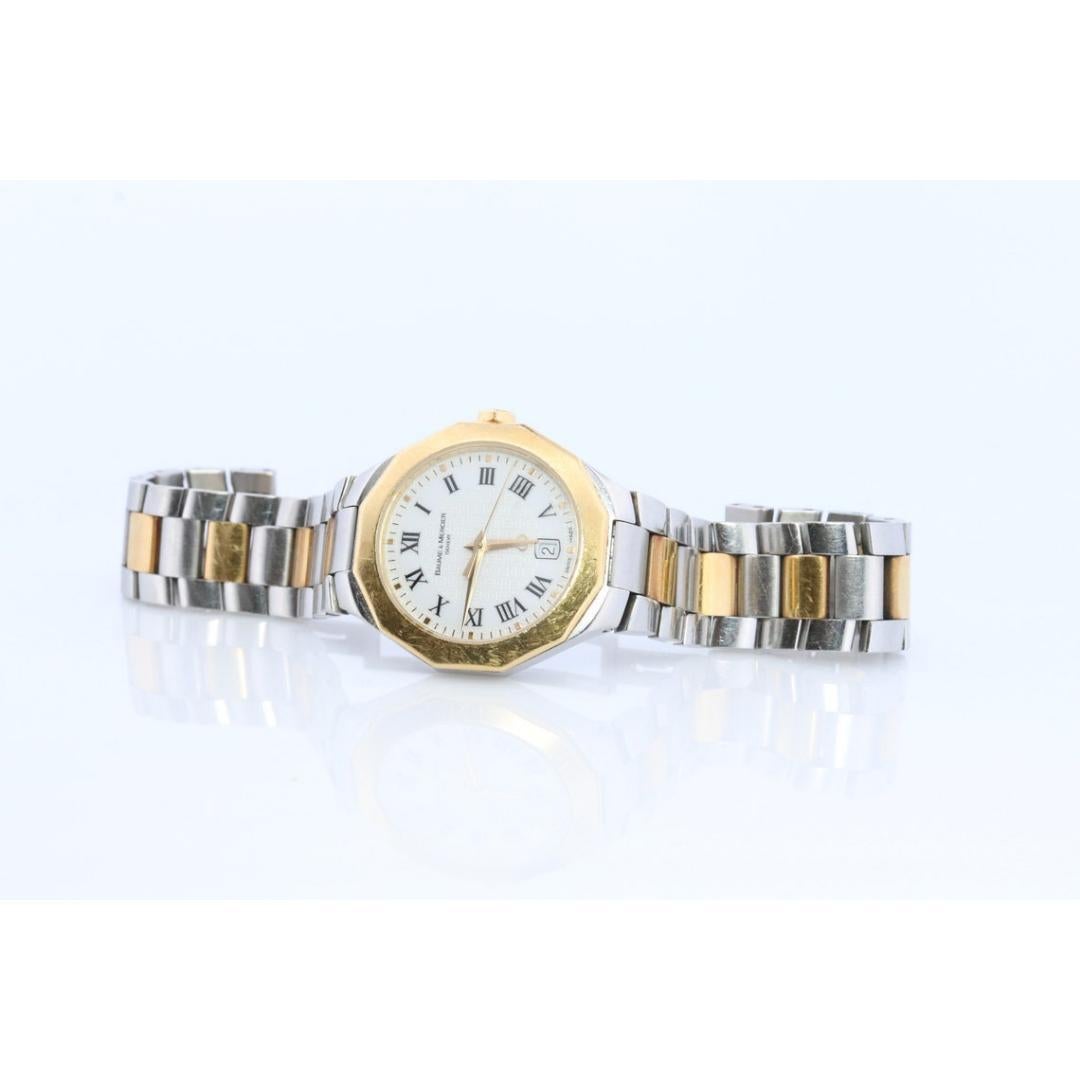 Vintage from the 1960s
Band material: Gold
Materials: Gold, Stainless steel
Power: Battery
Readout: Analog

Style: Art nouveau

Baume and Mercier Riviera Date Quartz watch

18k 750 Yellow Gold and Stainless Steel.

28mm case

Unisex